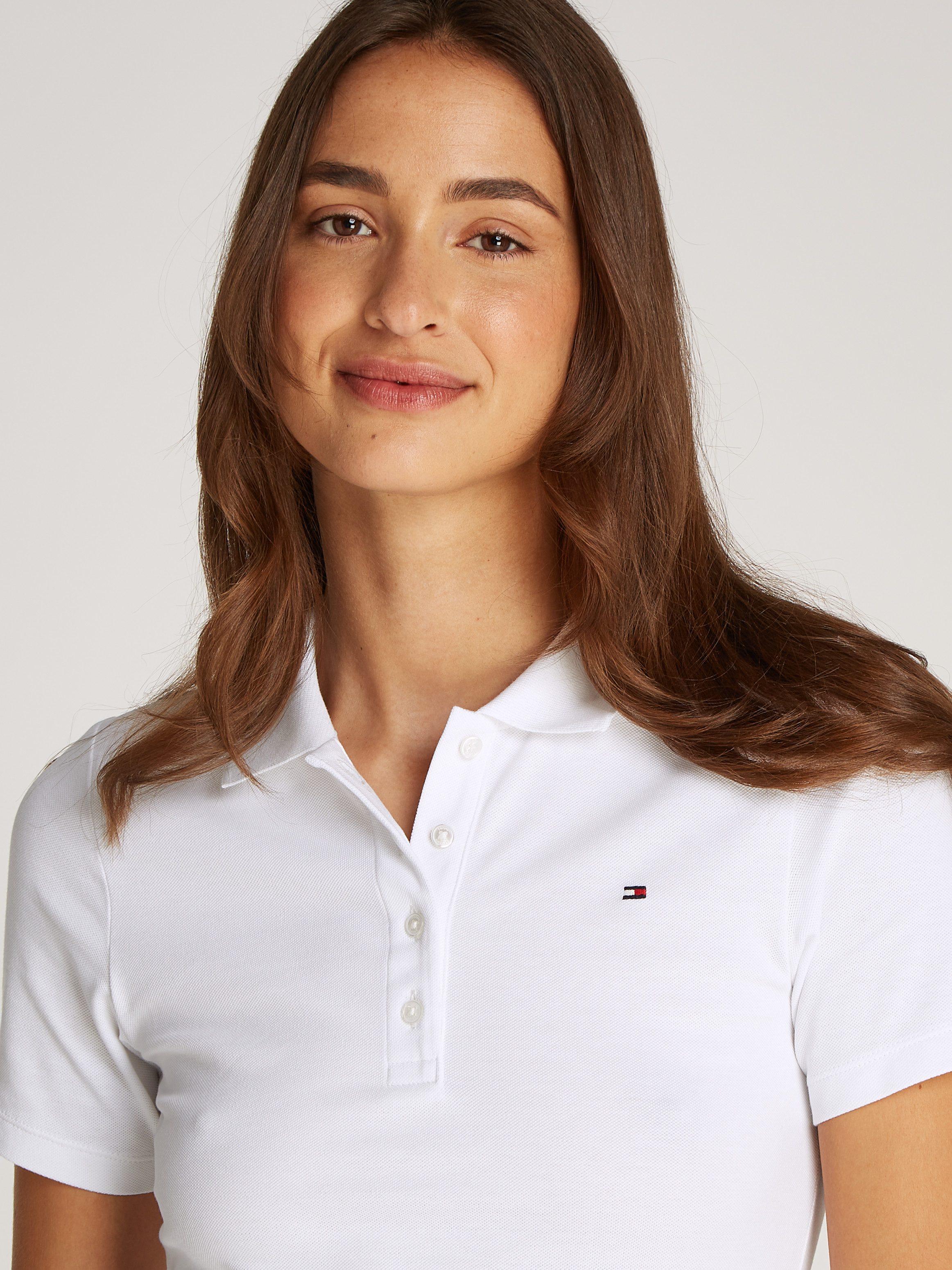 Tommy Hilfiger Poloshirt 1985 Slim Fit Pique Premium met logo-borduursel, met zijsplitten
