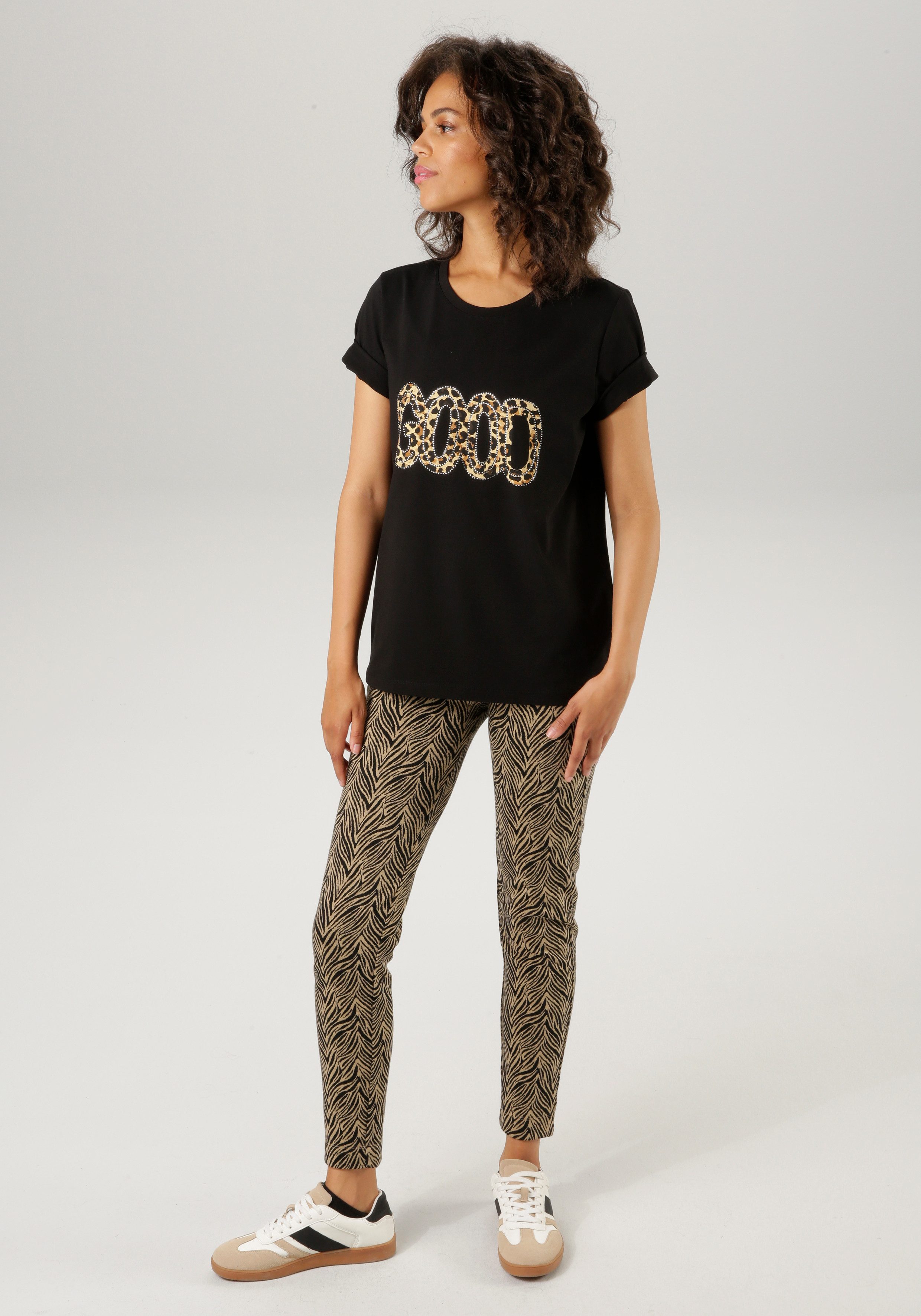 Aniston CASUAL Legging in zebra-look of ruitpatroon - beide zijn chic