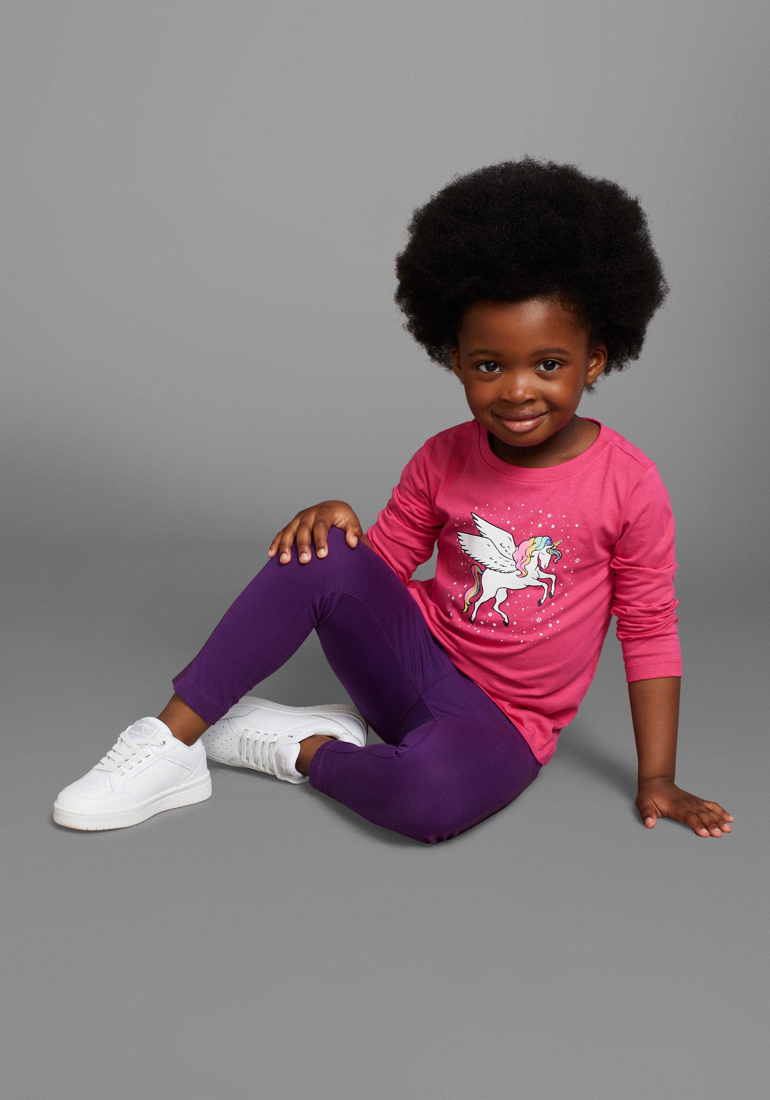 KIDSWORLD Shirt met lange mouwen Met leuke eenhoornprint lange mouwen, heuplange pasvorm, stijlvolle print