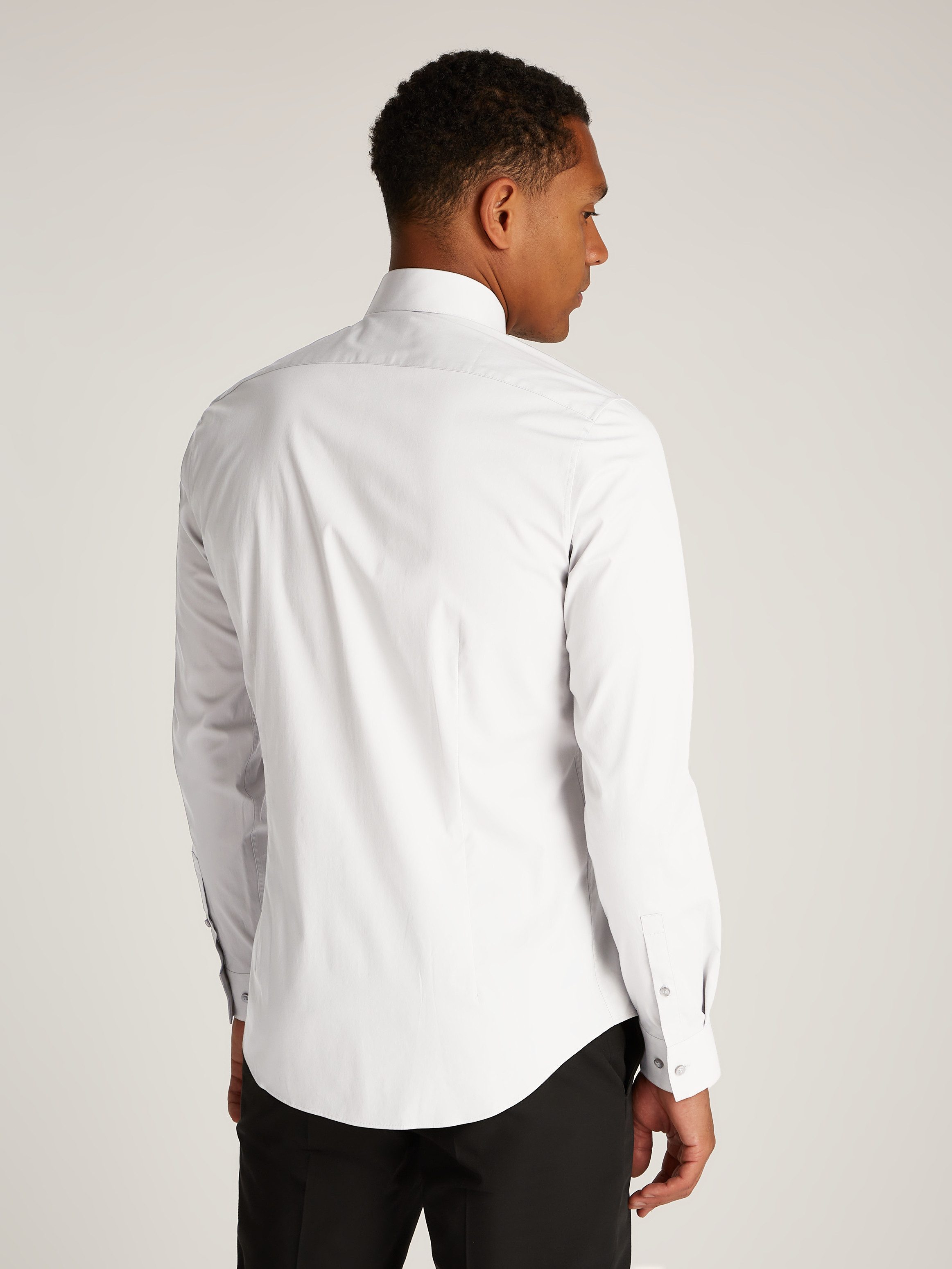 Calvin Klein Businessoverhemd POPLIN STRETCH SLIM SHIRT met kent-kraag, logoprint op borsthoogte