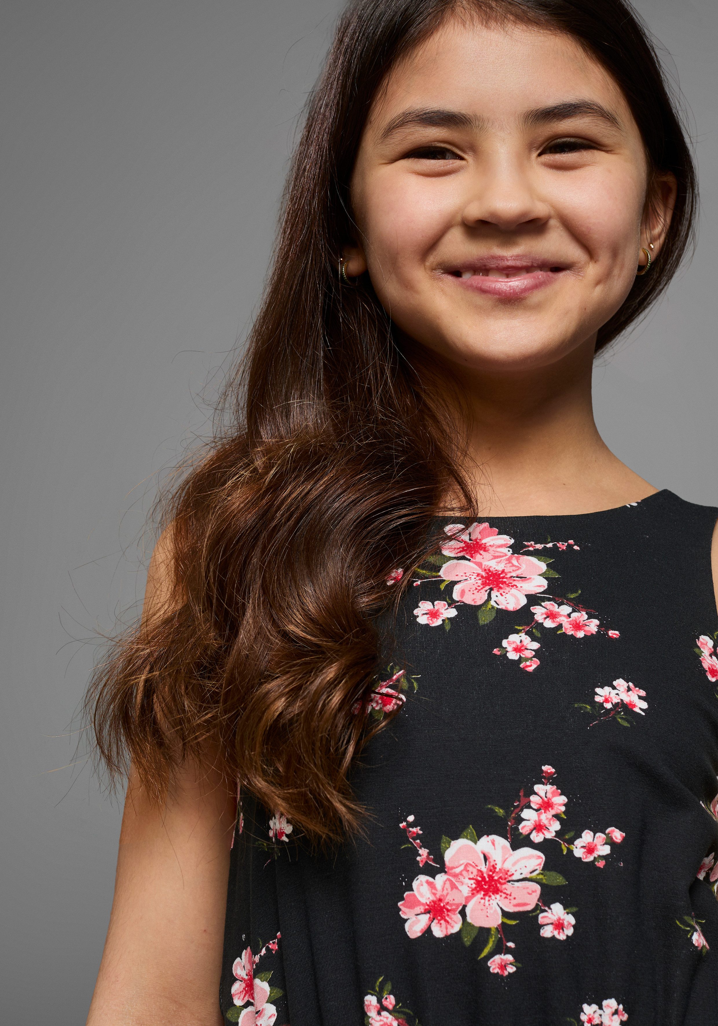 KIDSWORLD Jerseyjurk Voor meisjes zomerse, knie-vrije, bloemige, van katoenmix, mouwloos