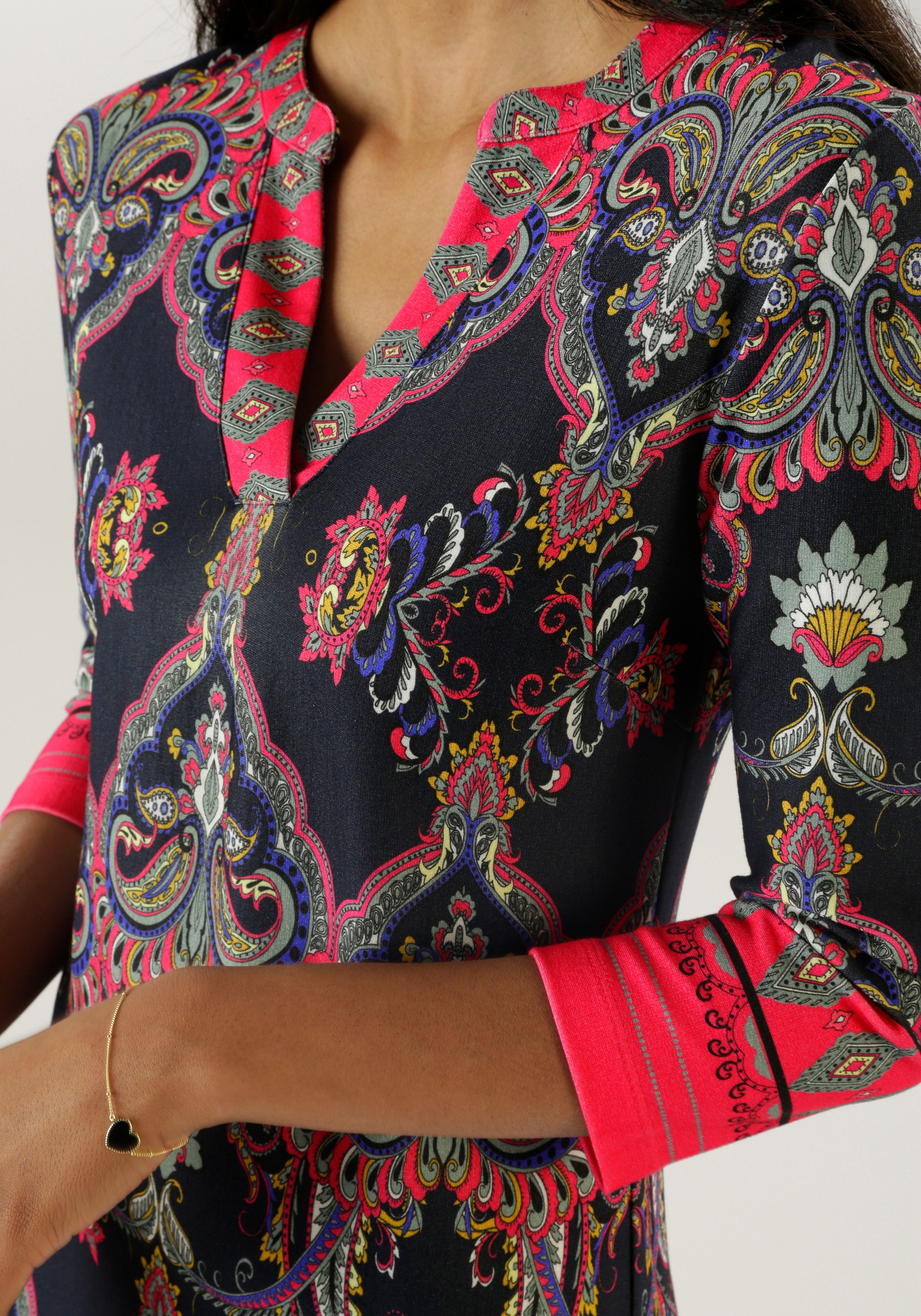 Aniston SELECTED Jerseyjurk met ornamenten- en rankenprint allover