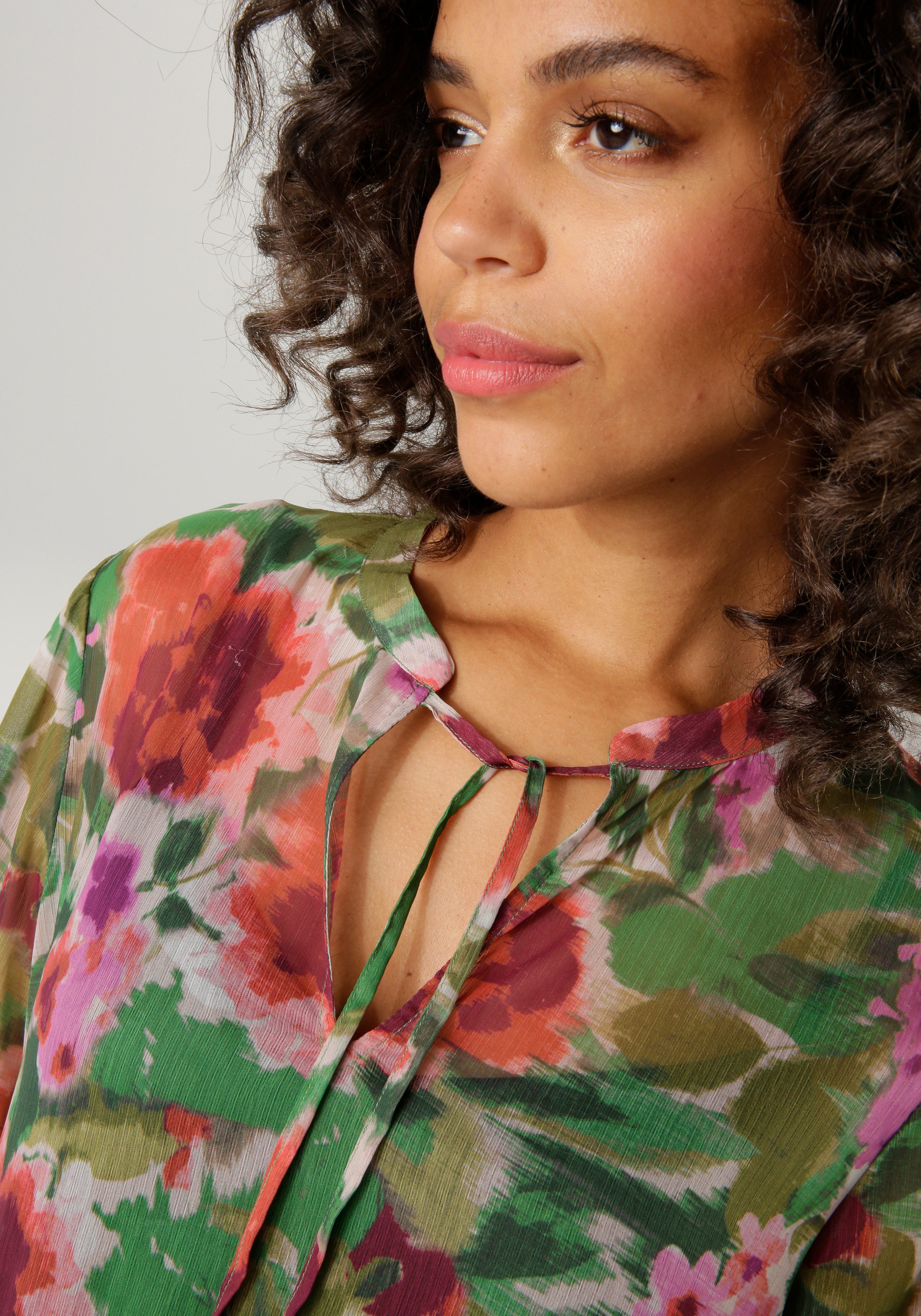 Aniston CASUAL Maxi-jurk met kleurharmonieuze bloemenprint in batik-look (Met jersey onderjurk)