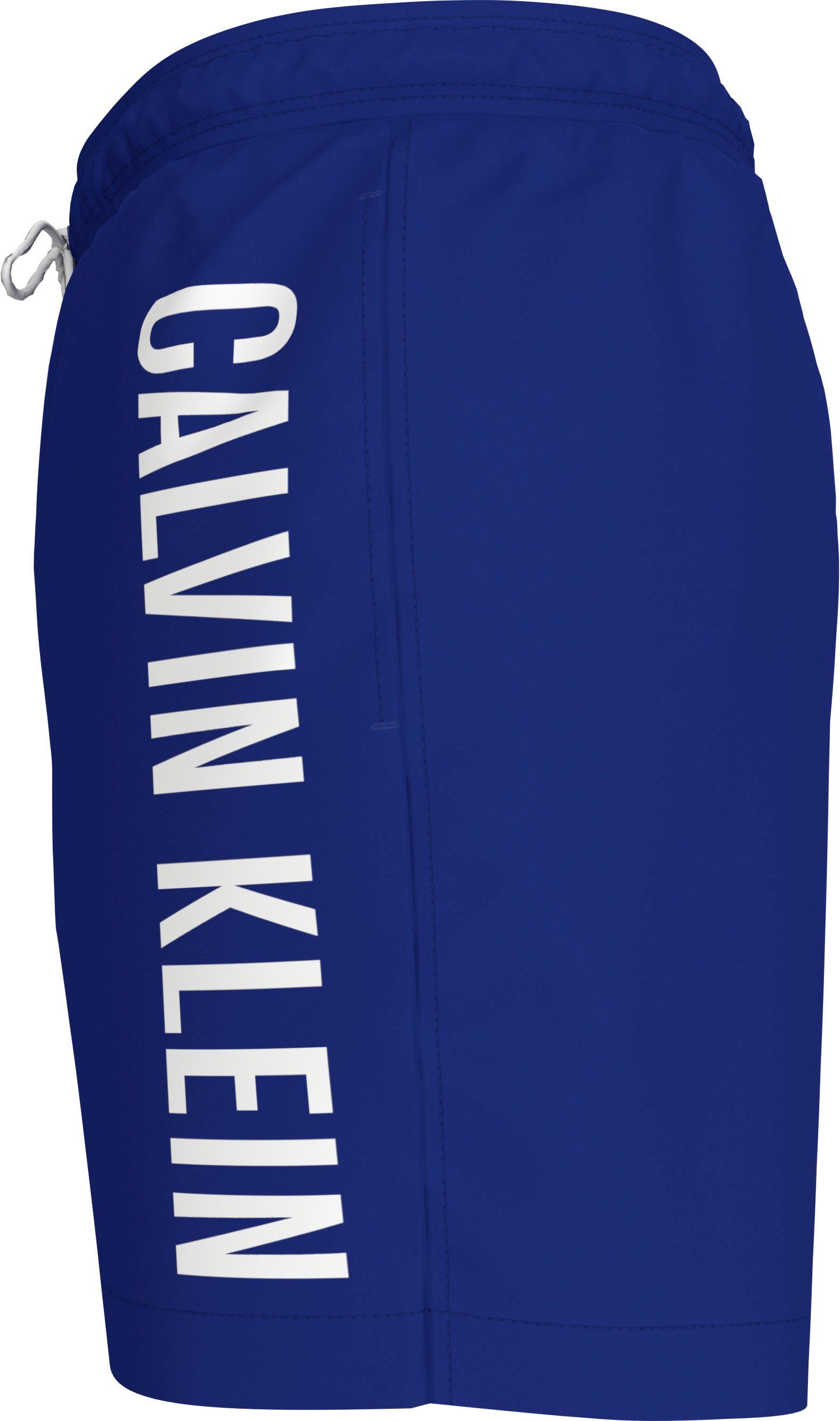 Calvin Klein Swimwear Zwemshort MEDIUM DRAWSTRING met contrasterende logo-opdruk op de pijp