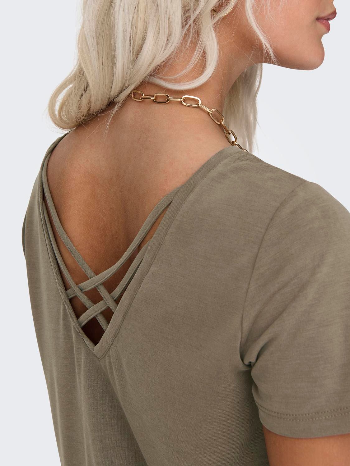 Only Shirt met korte mouwen ONLFREE LIFE S/S CROSS BACK TOP BOX JRS
