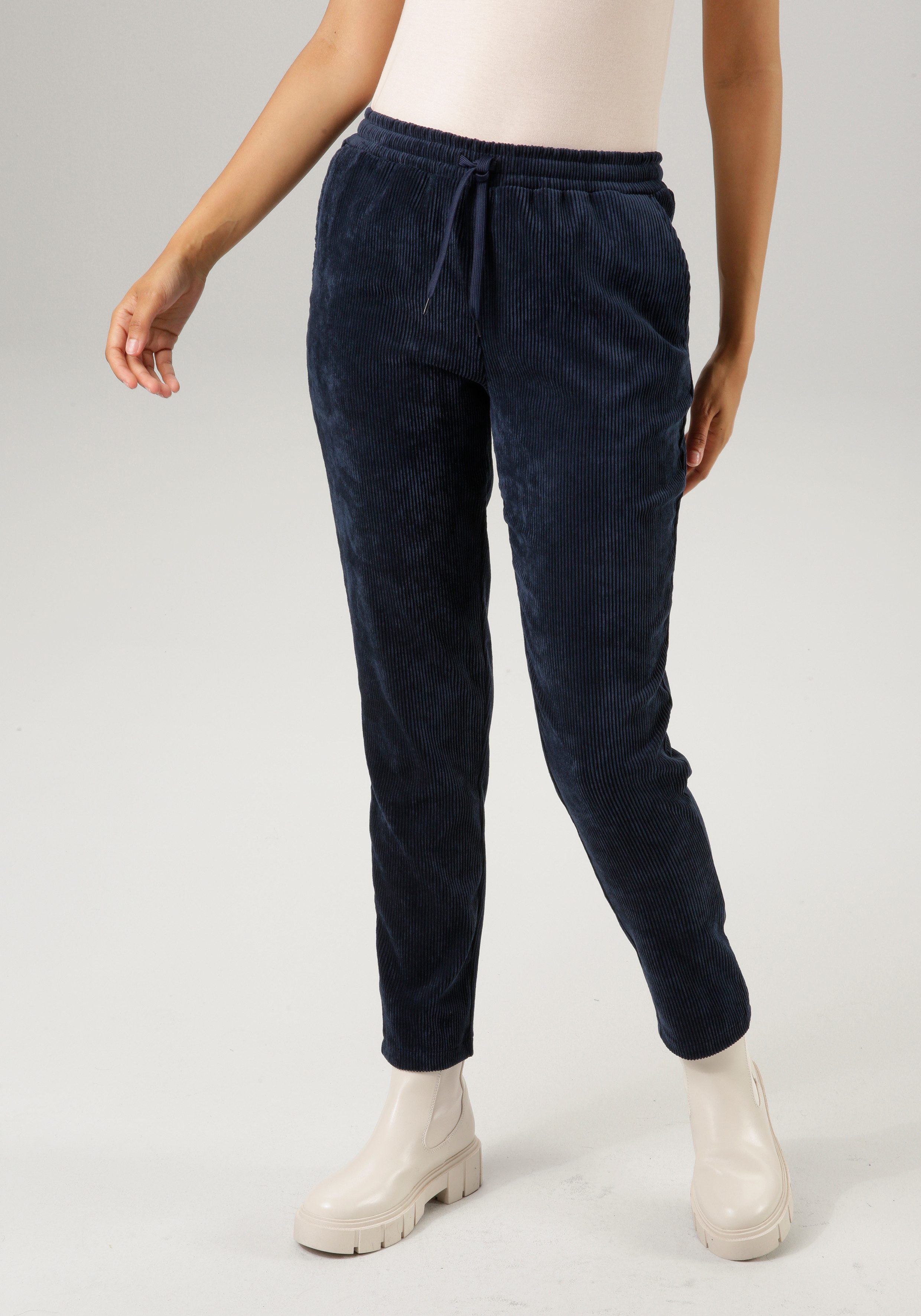 Aniston CASUAL Comfortbroek van trendy, elastische cord