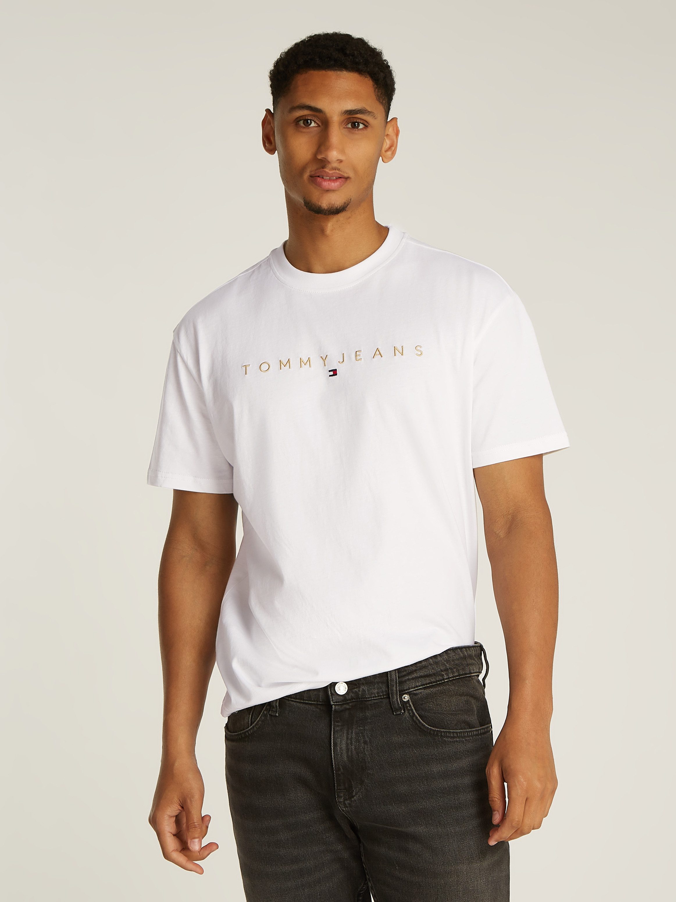 TOMMY JEANS T-shirt TJM REG GOLD LINEAR LOGO TEE EXT