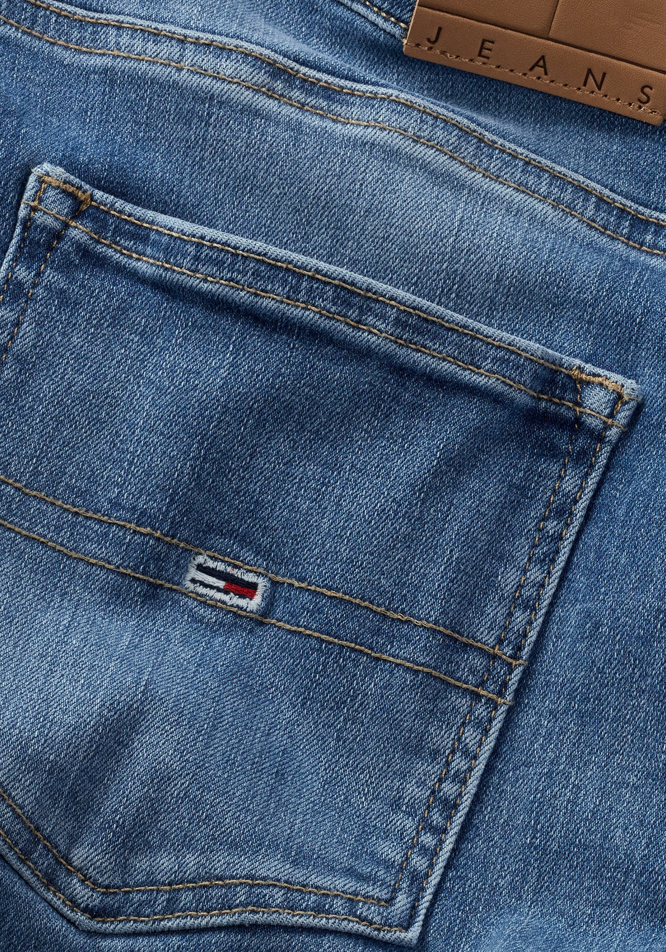 TOMMY JEANS Wijd uitlopende jeans Tommy Jeans SYLVIA - High waist - Flared Denim Jeans