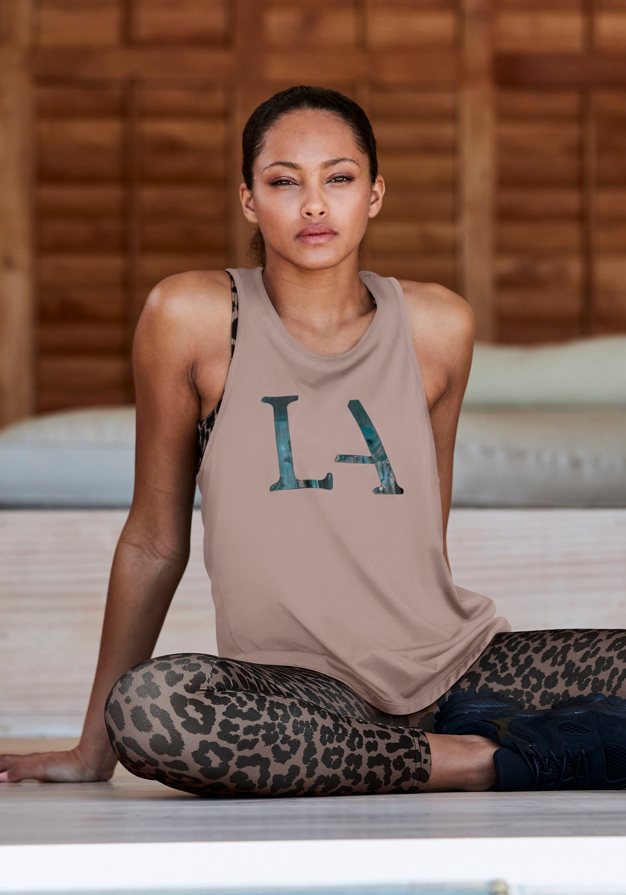 active by Lascana Functioneel shirt met cut-out achter