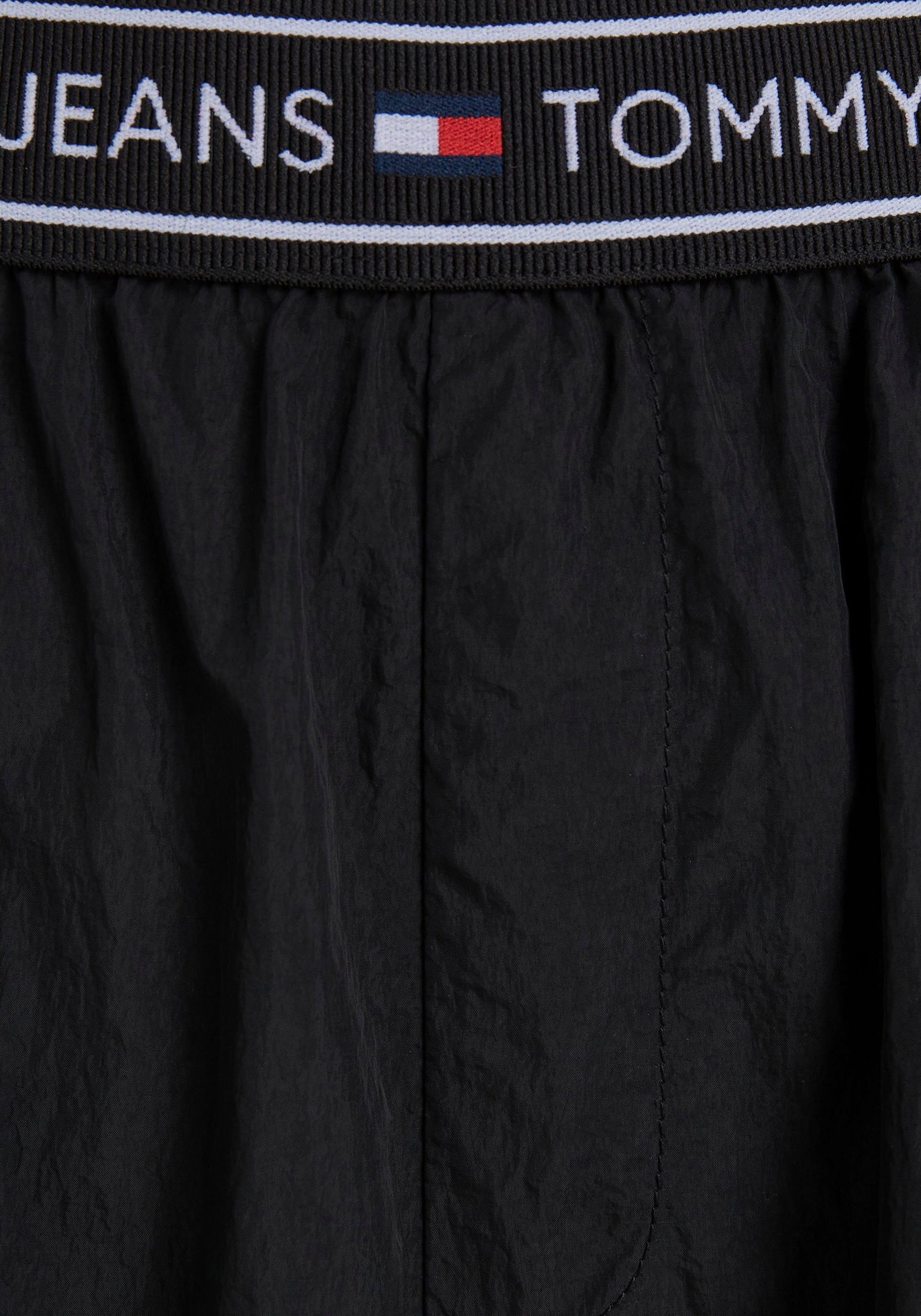 Tommy Jeans Curve Geweven broek TJW BAGGY TAPING TRACKPANT EXT