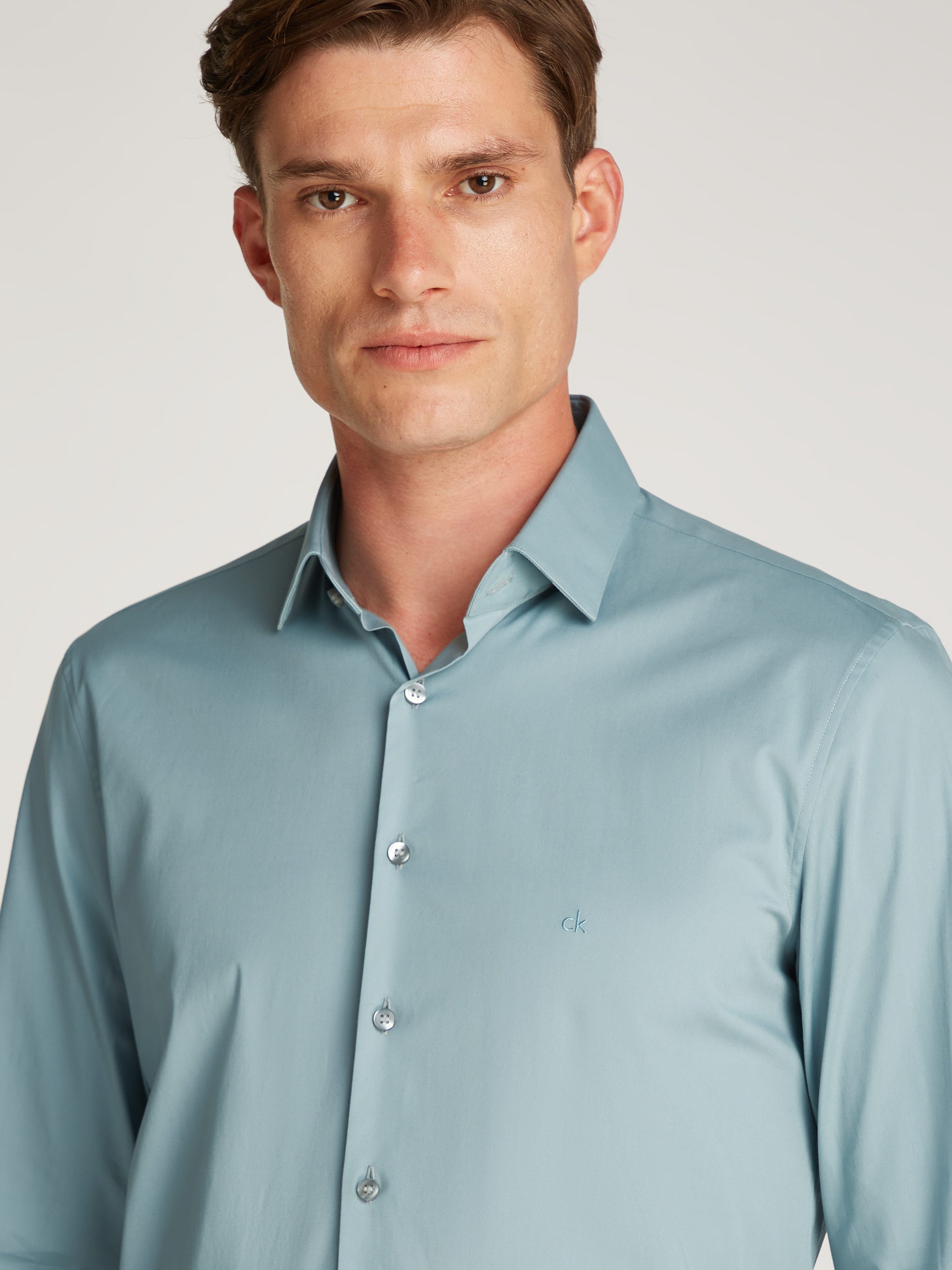 Calvin Klein Businessoverhemd POPLIN STRETCH SLIM SHIRT met kent-kraag, logoprint op borsthoogte