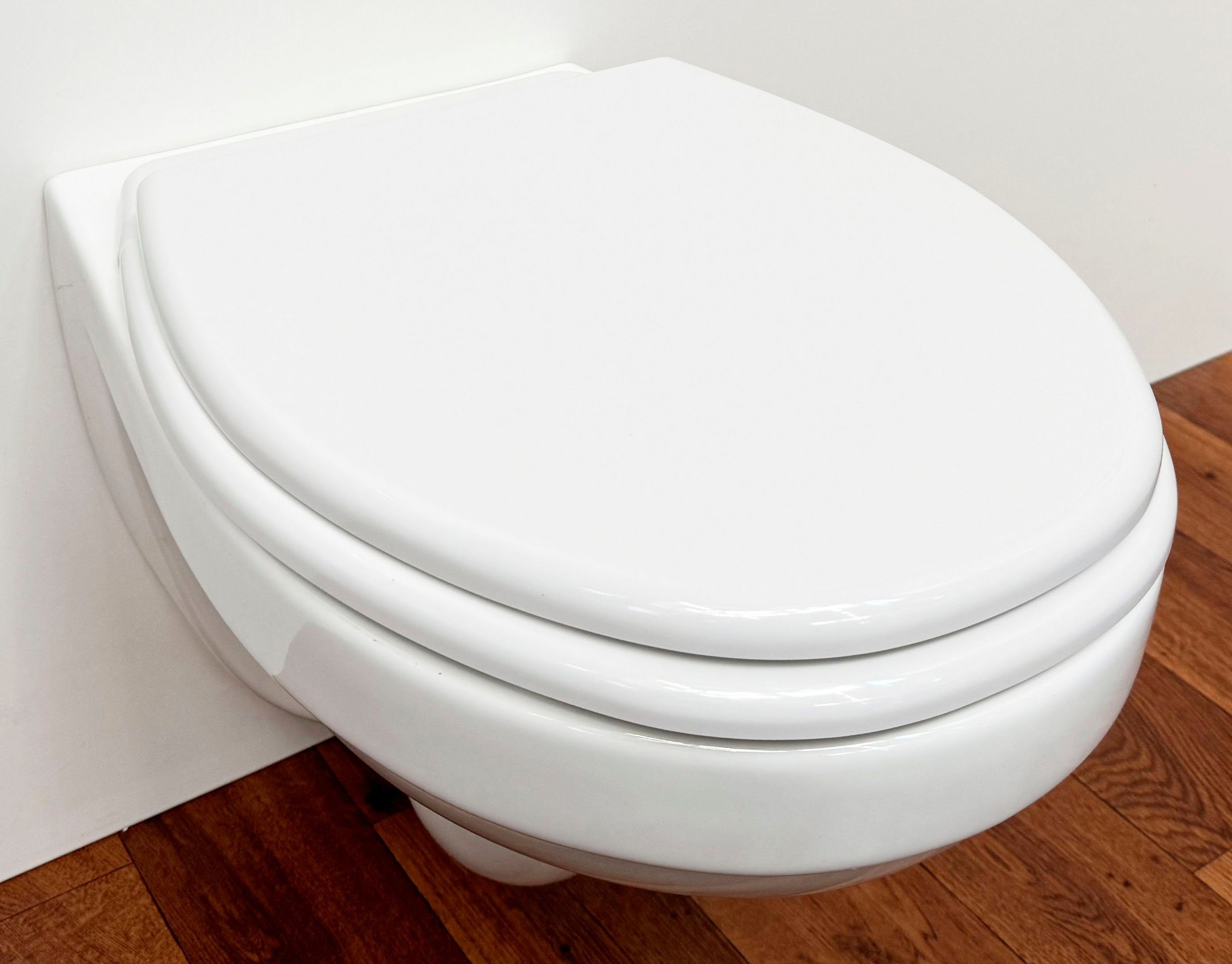 ADOB Toiletzitting Milano met rugpaneel als probleemoplosser
