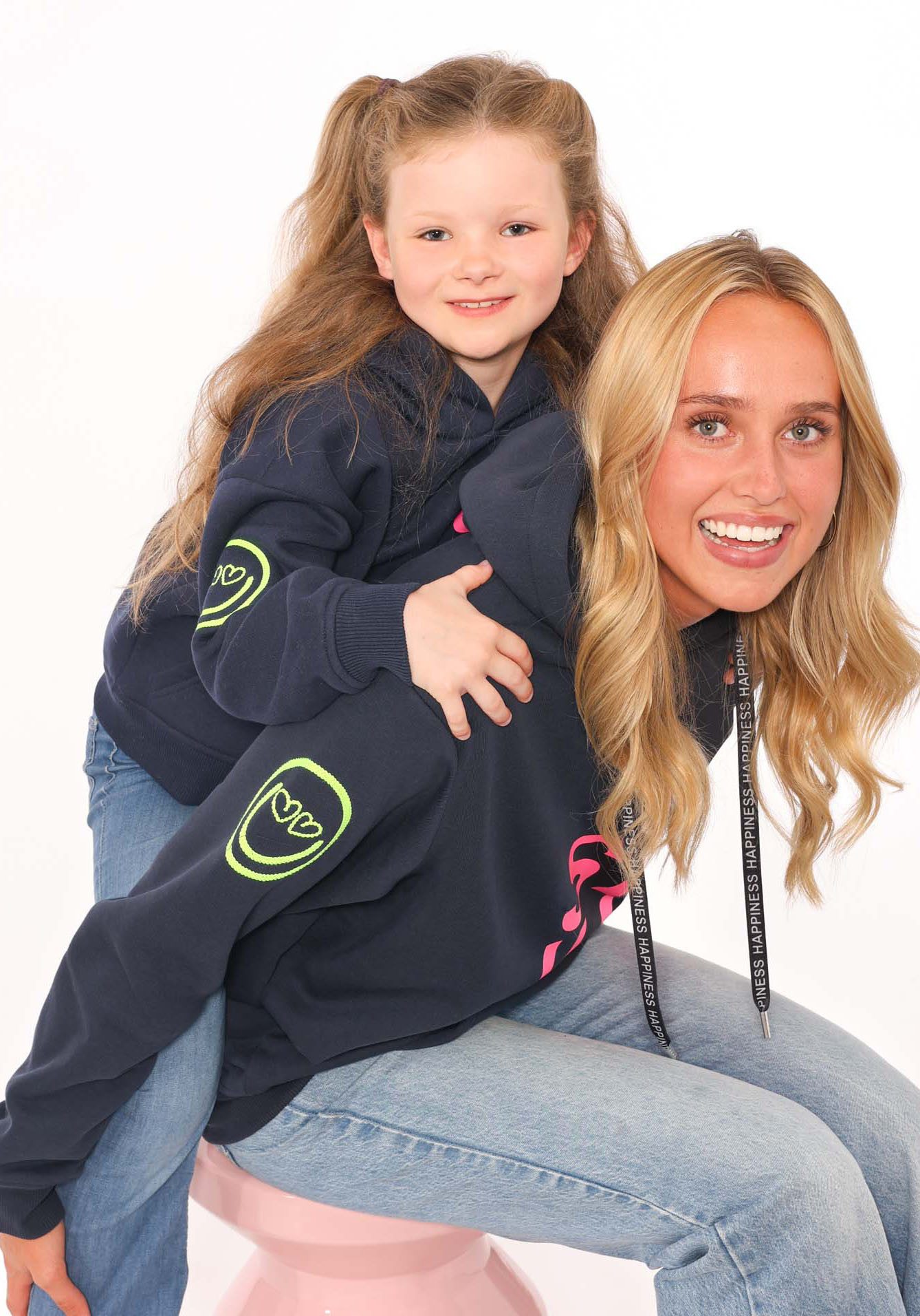 Zwillingsherz Hoodie Alissa-Kids met "smile"-opdruk in neonkleur en geborduurde smiley
