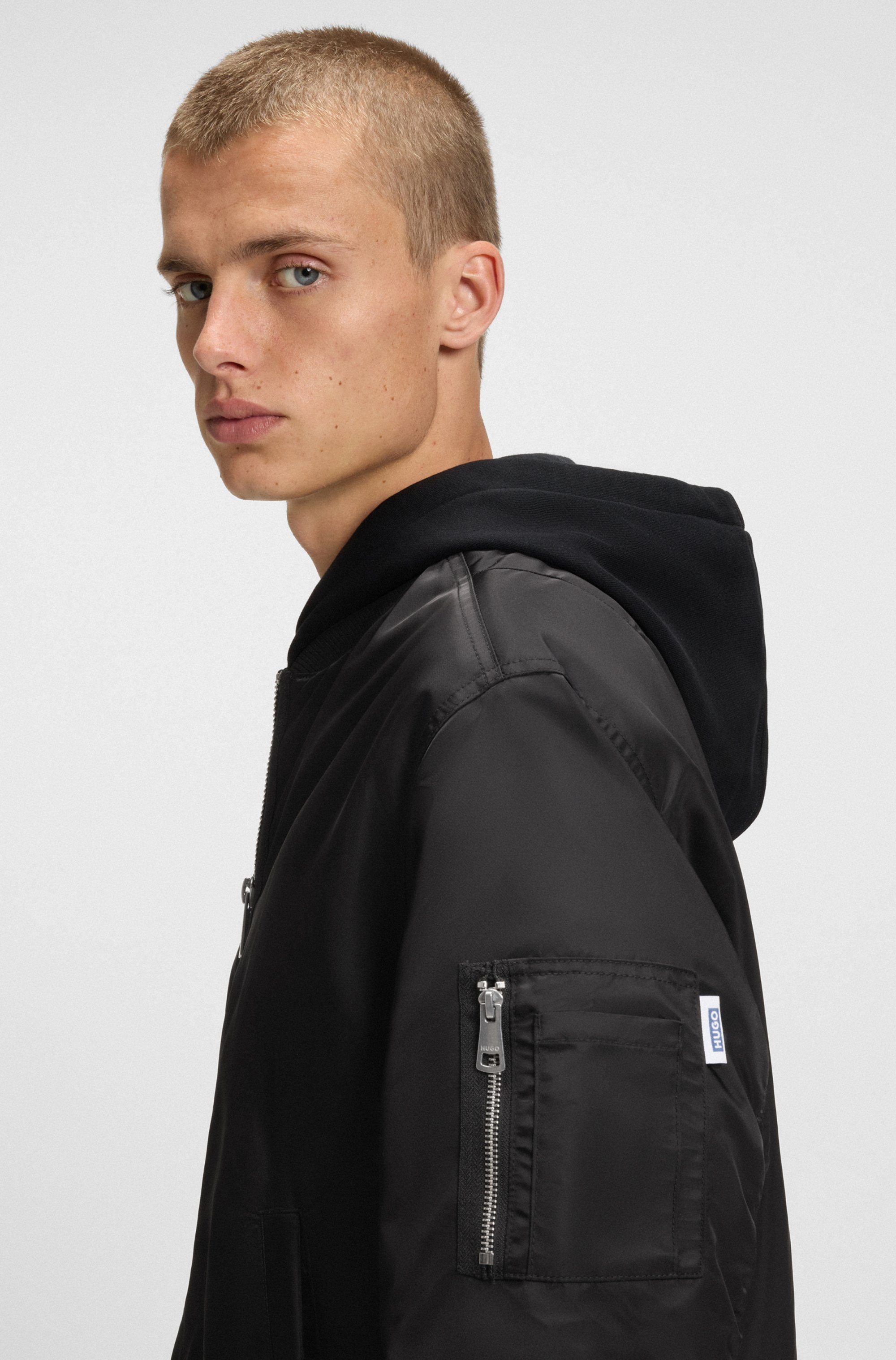 HUGO Blue Blouson Biero met waterafstotende afwerking en mouwzak