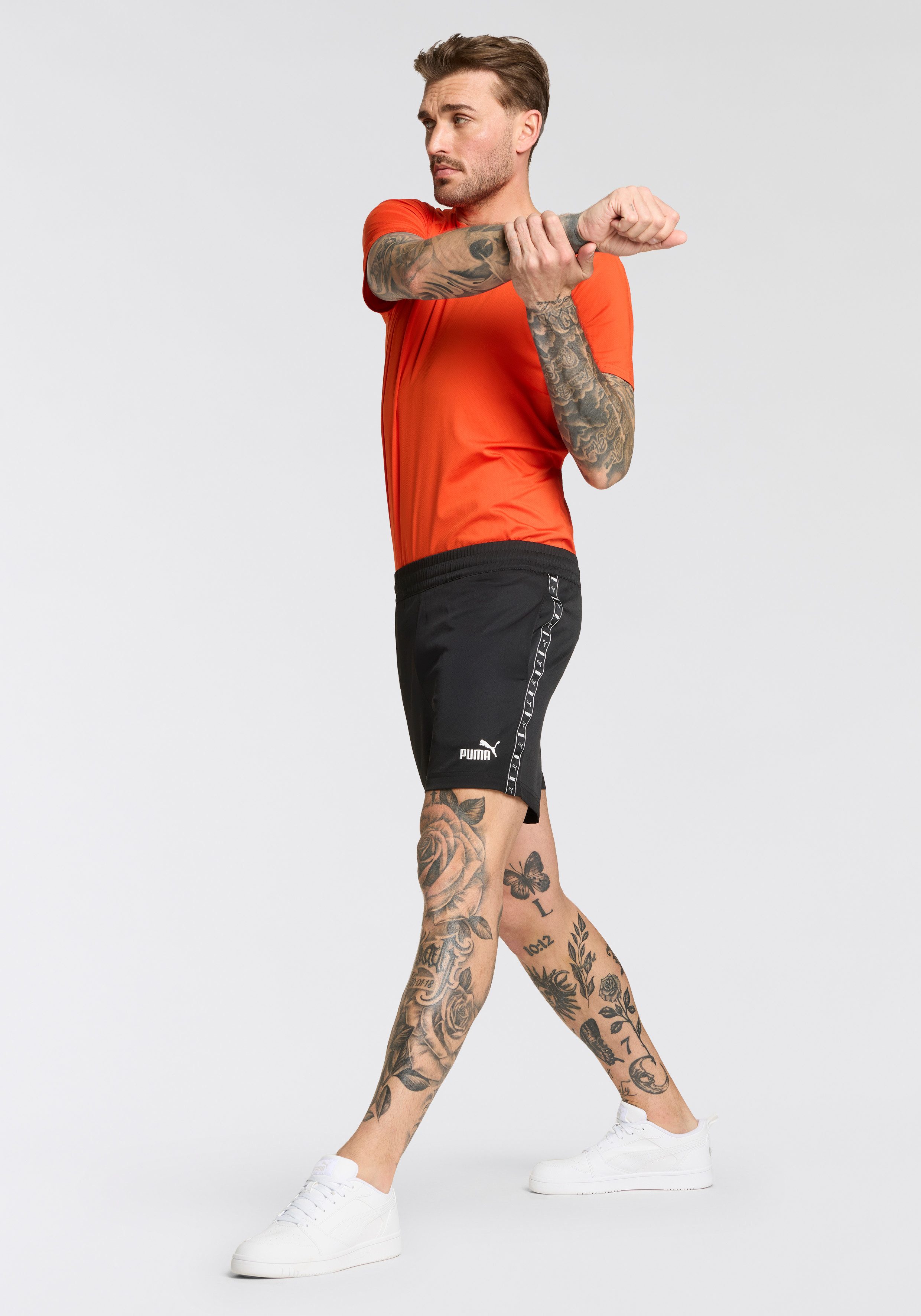 PUMA Short ESS TAPE WOVEN SHORTS 5" voor heren, tape-stripes aan het been