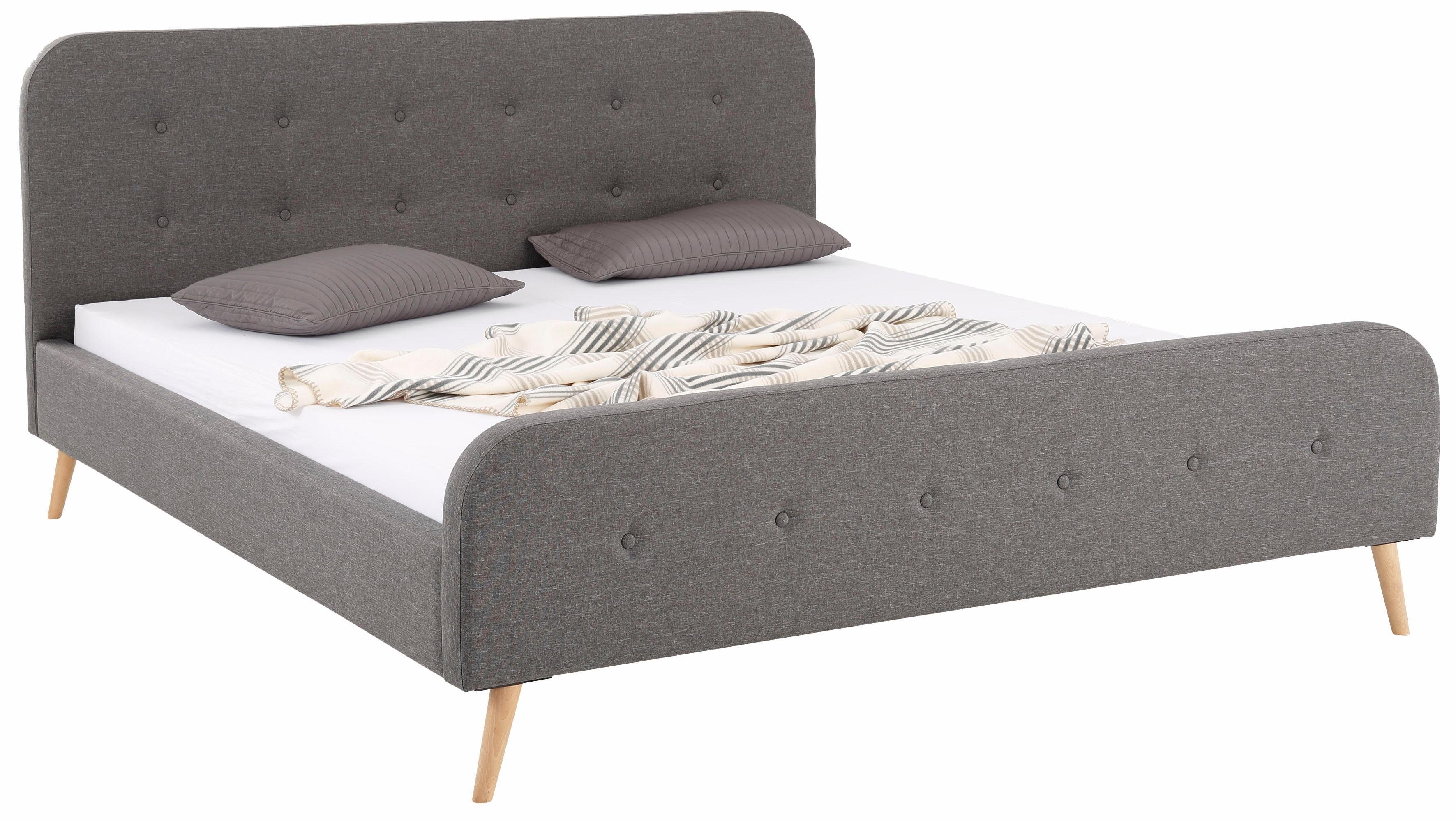 Home affaire Gestoffeerd bed Amrum met luxueuze knopen aan het zacht verdikte hoofd- en voetbord