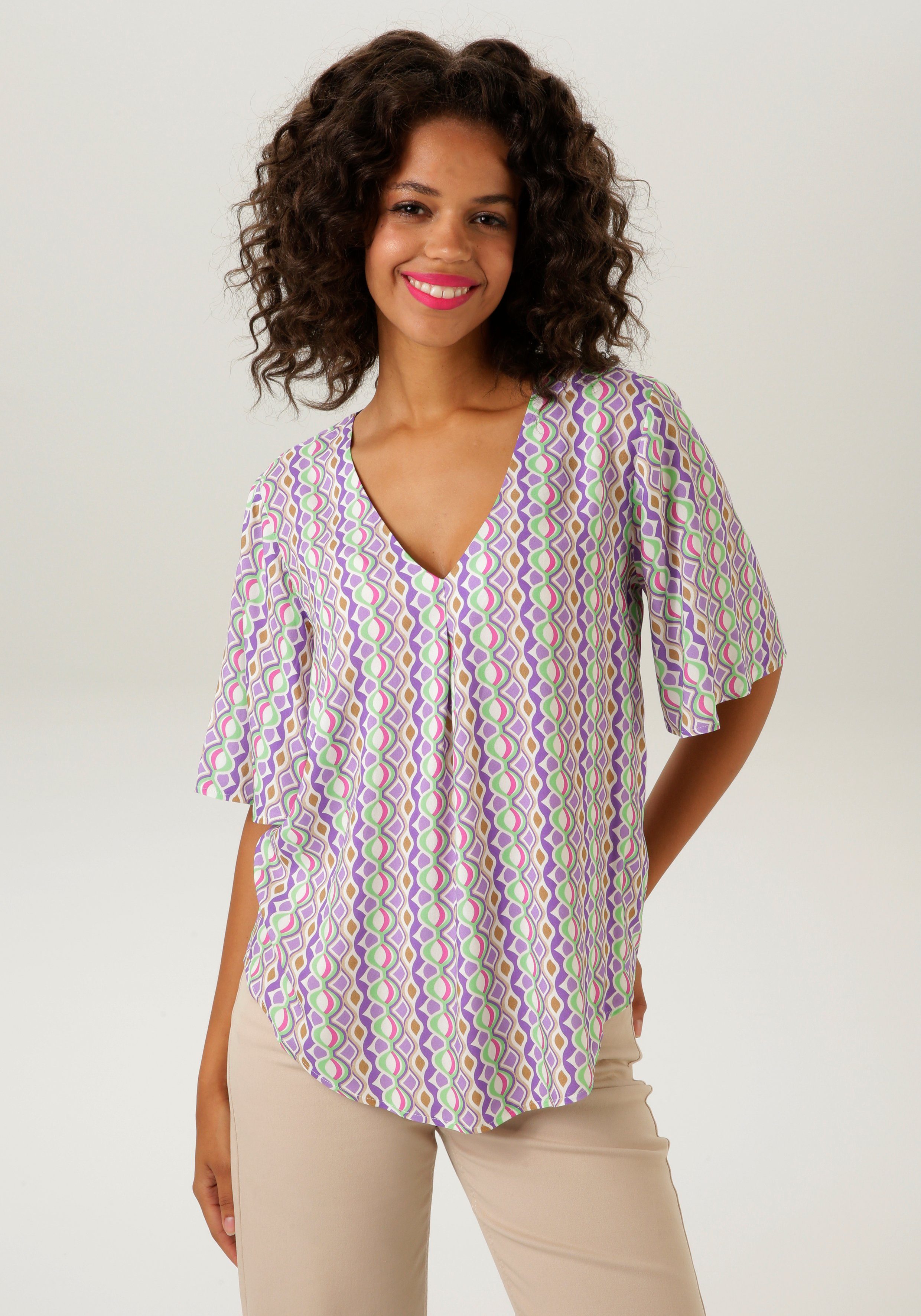 Aniston CASUAL Blouse zonder sluiting met trendy kleuren retroprint