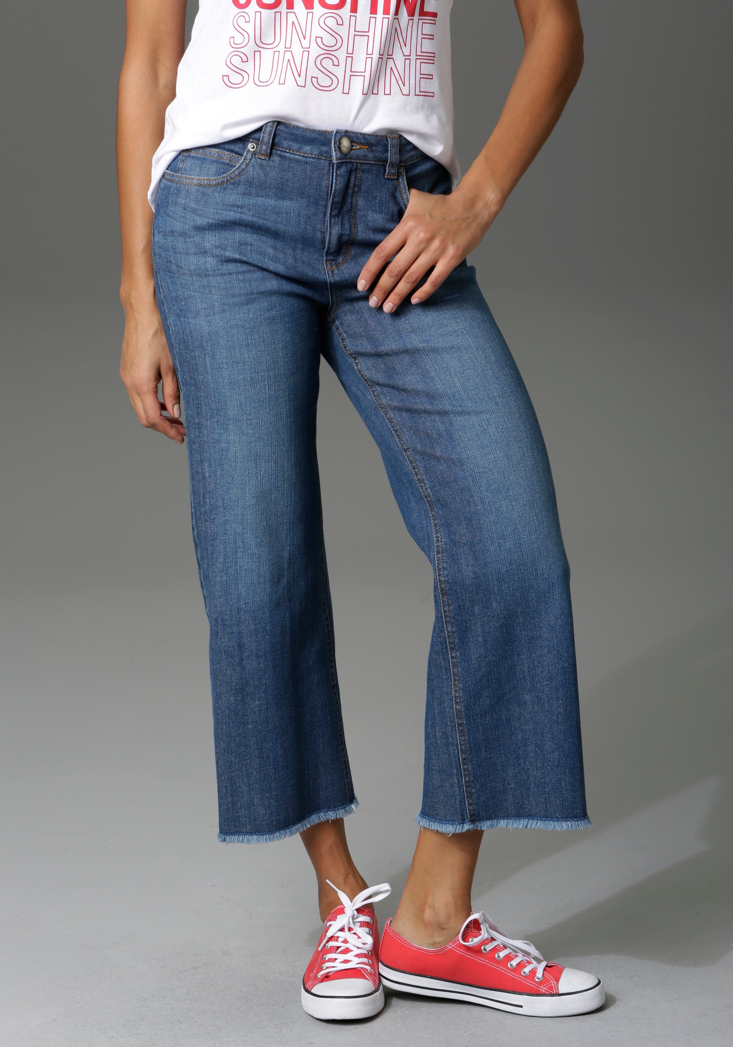 Aniston CASUAL 7/8 jeans met iets gerafelde voetzoom