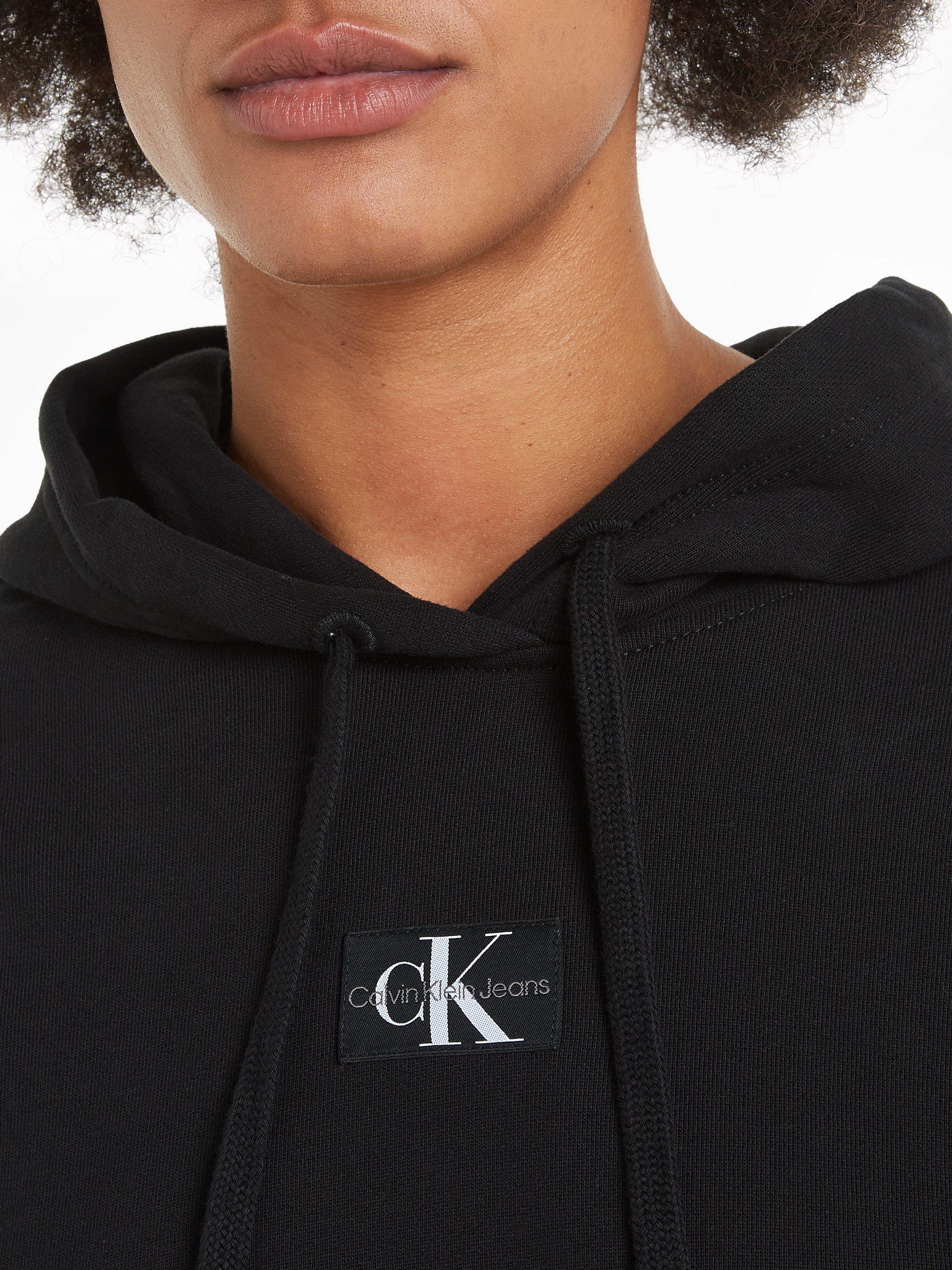 Calvin Klein Lang sweatshirt WOVEN LABEL OVERSIZED HOODIE