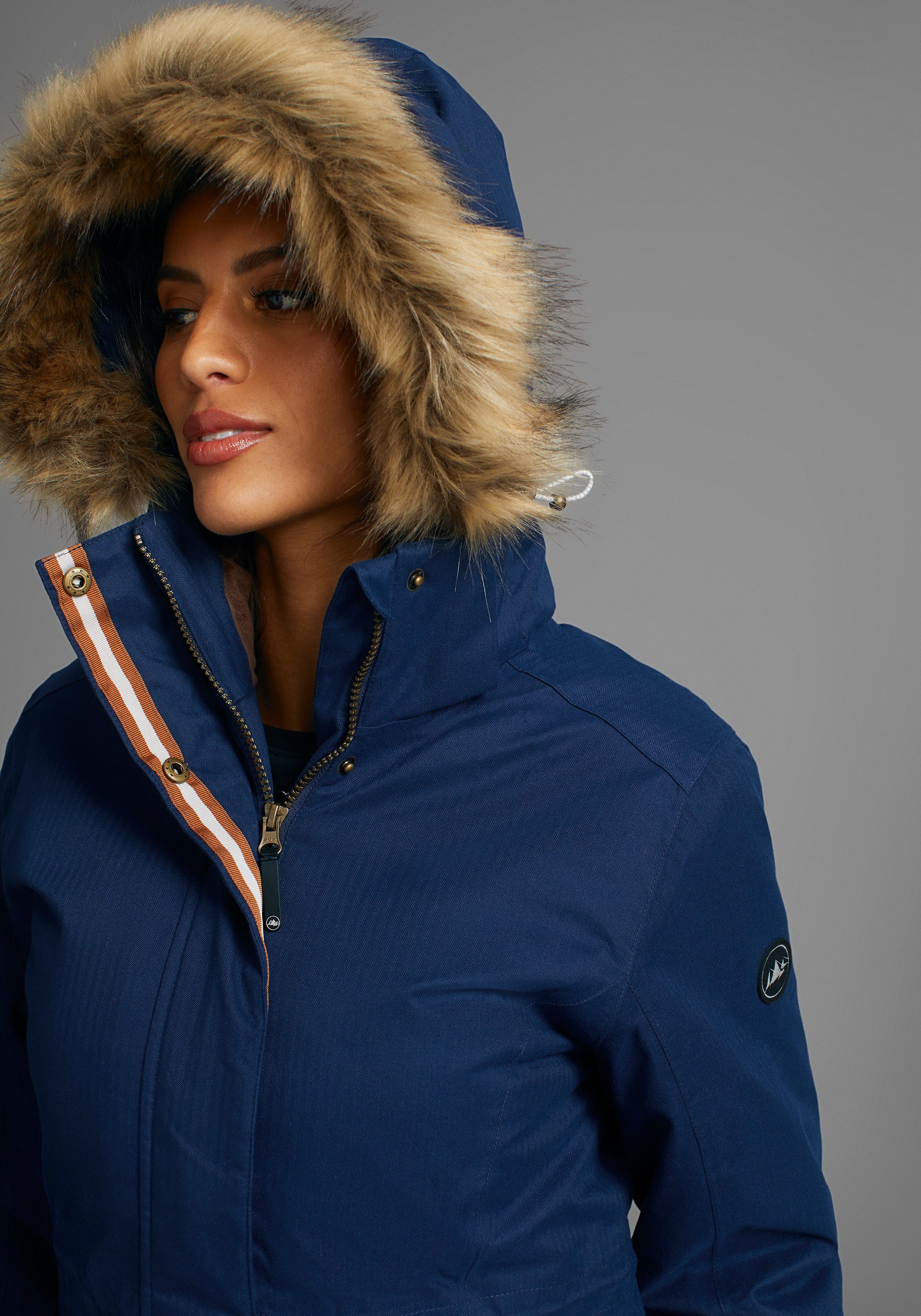 Polarino Functionele parka Ademend, winddicht en waterdicht. Warm gewatteerd.