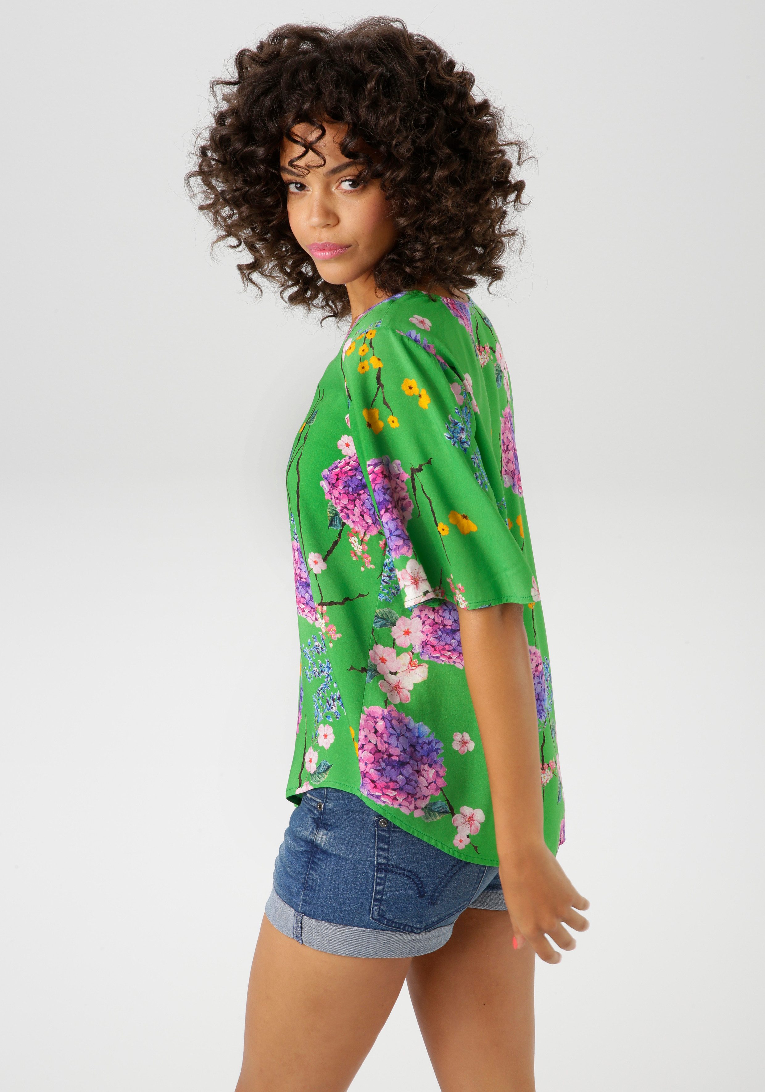 Aniston CASUAL Blouse zonder sluiting met kleurharmonische bloemdruprint - nieuwe collectie