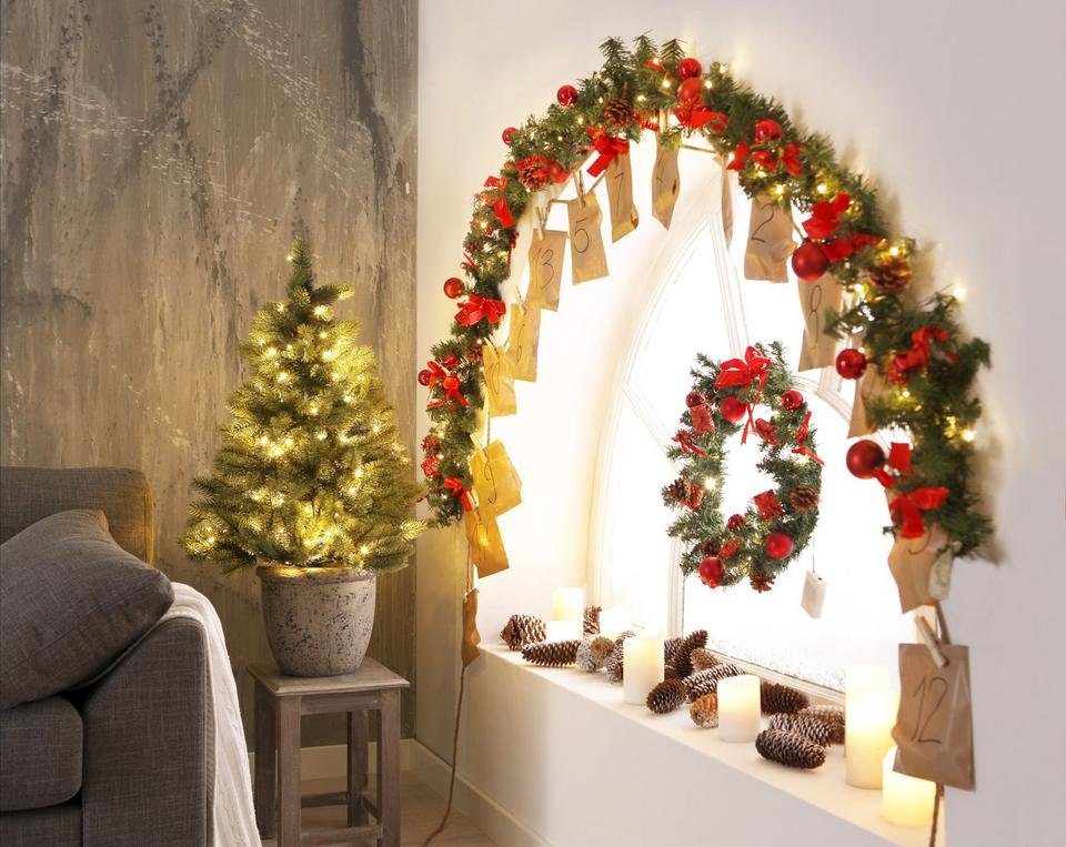 Creativ deco Kunstkerstboom Kerstversiering, kunstmatige kerstboom, dennenboom met zwarte kunststof pot en led-lichtsnoer, werkt op batterijen