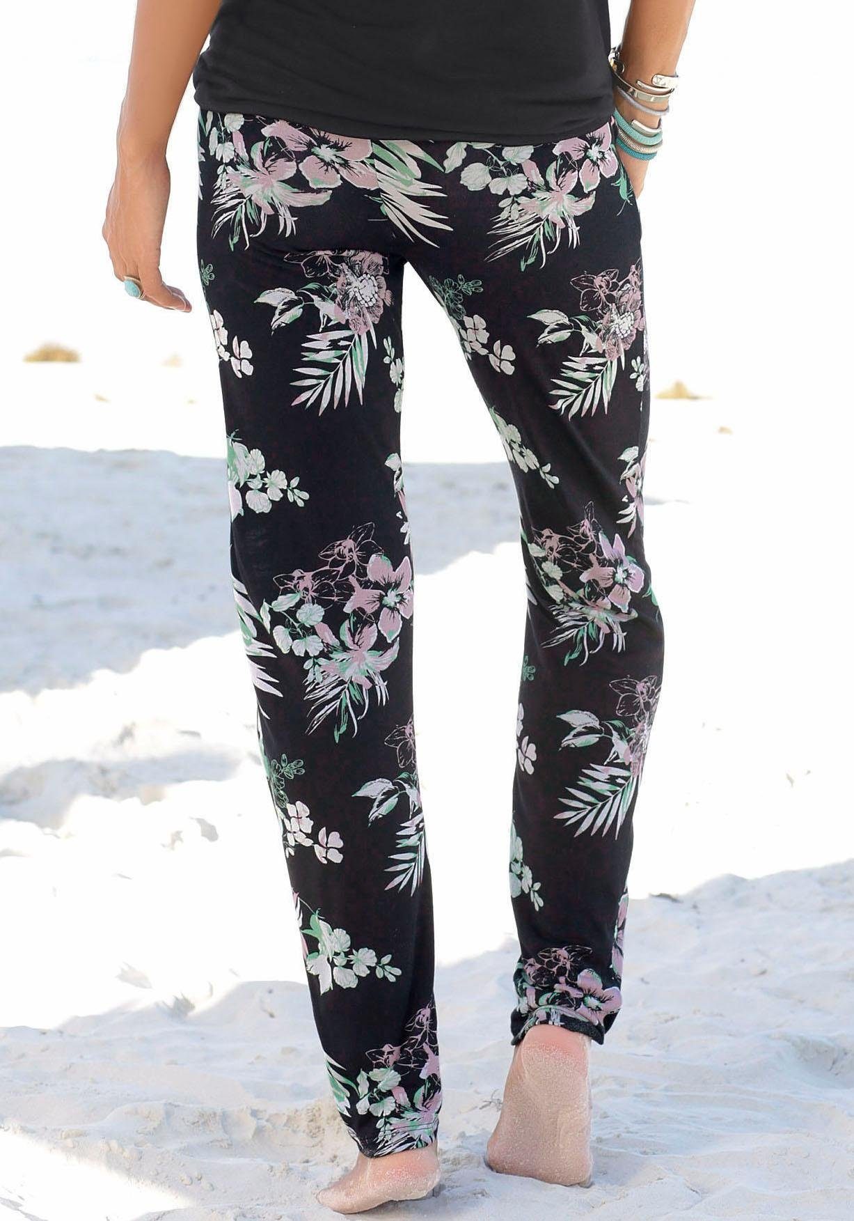 Lascana Strandbroek met tropische print en zakken, jersey broek, zomerbroek