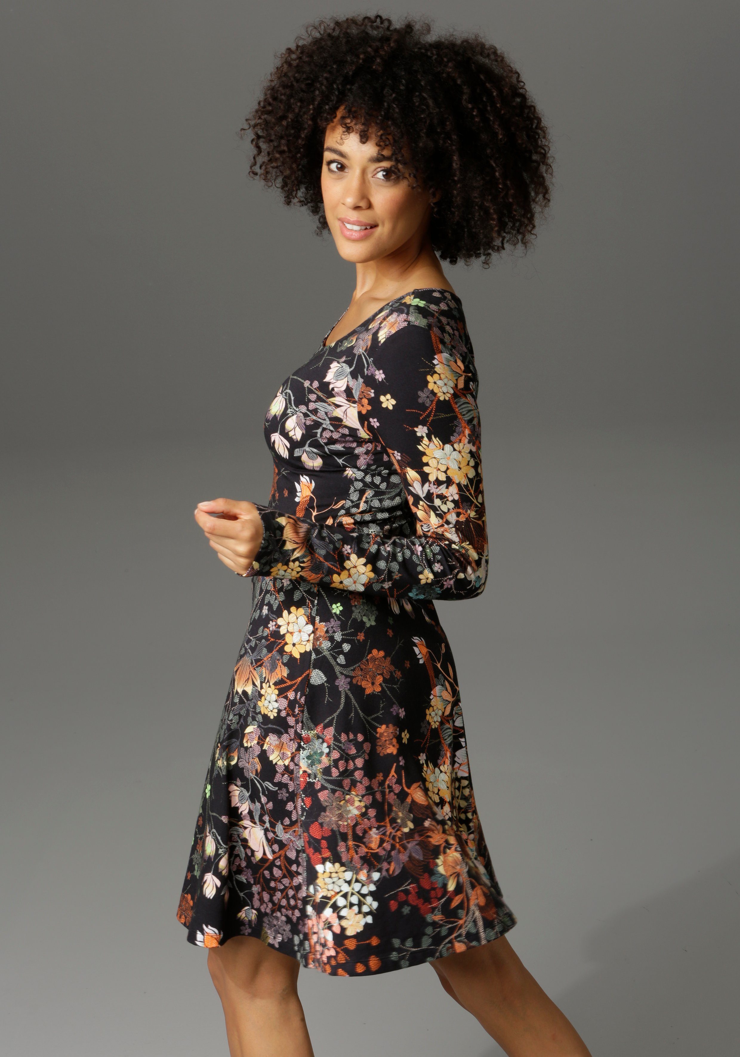 Aniston CASUAL Jerseyjurk met bloemenprint of in uni-zwart