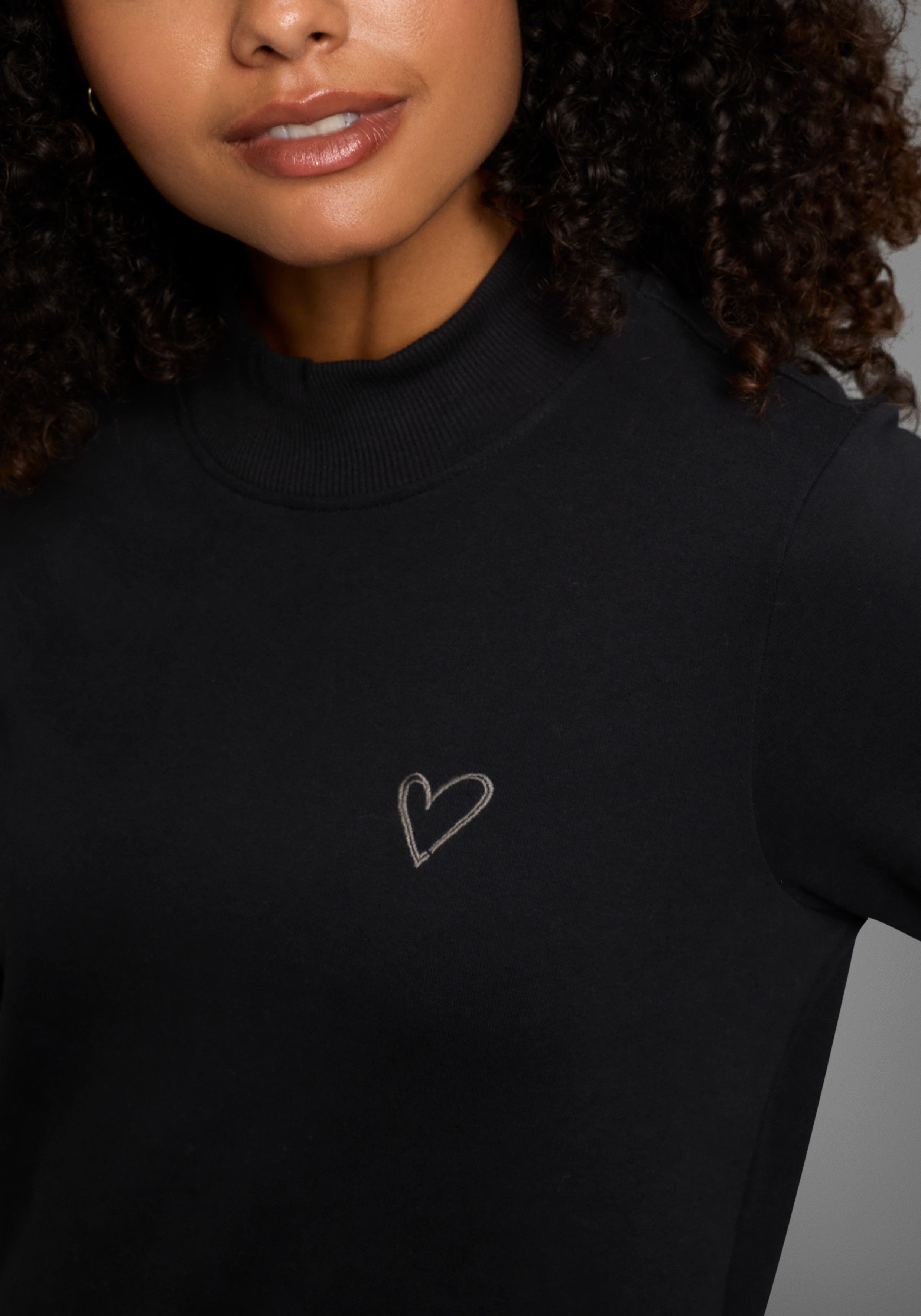 KangaROOS Lang sweatshirt met turtleneck en split aan de zoom