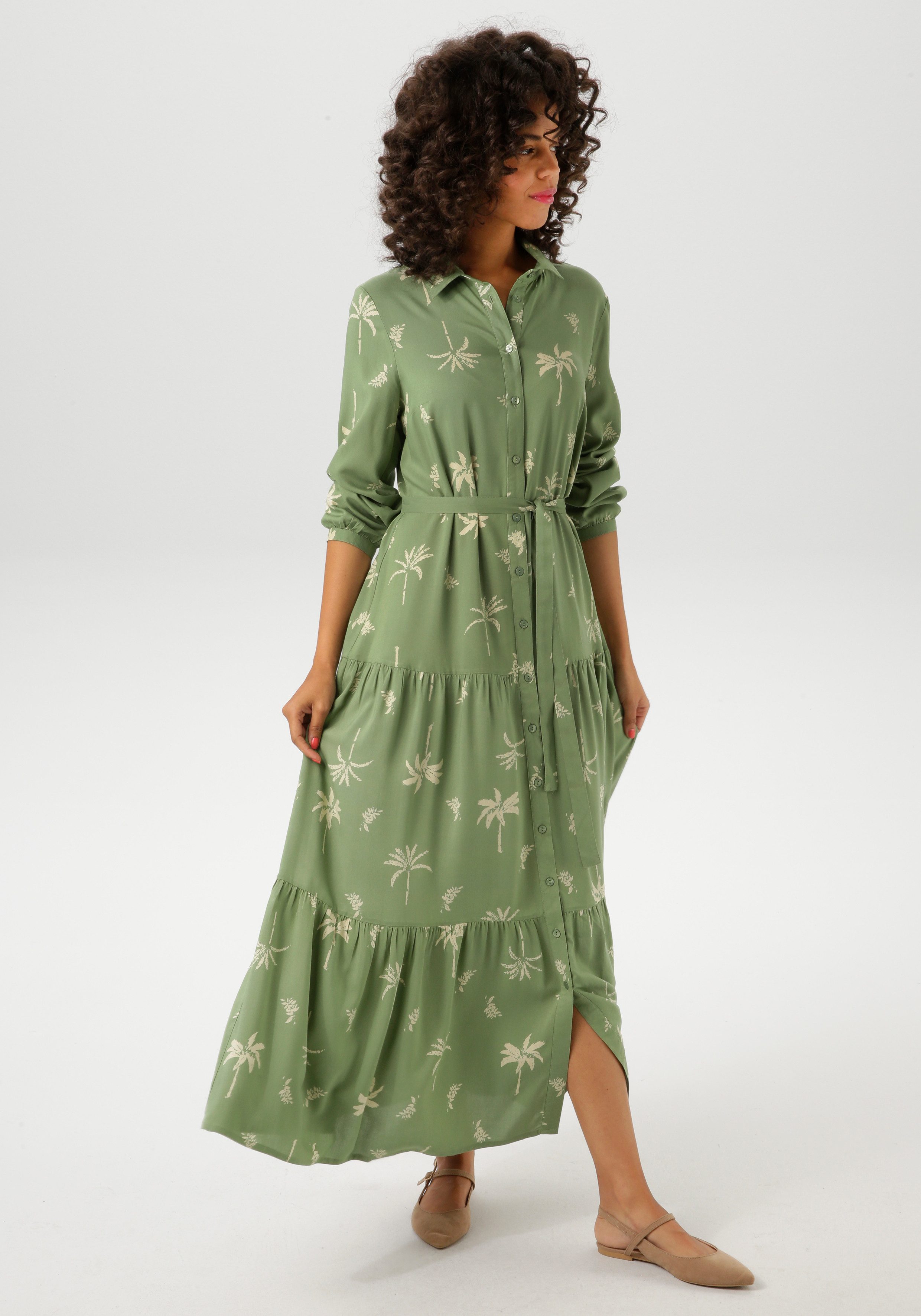Aniston CASUAL Maxi-jurk met palmen bedrukt - elk stuk is uniek - nieuwe collectie (Met een afneembare bindstrik)