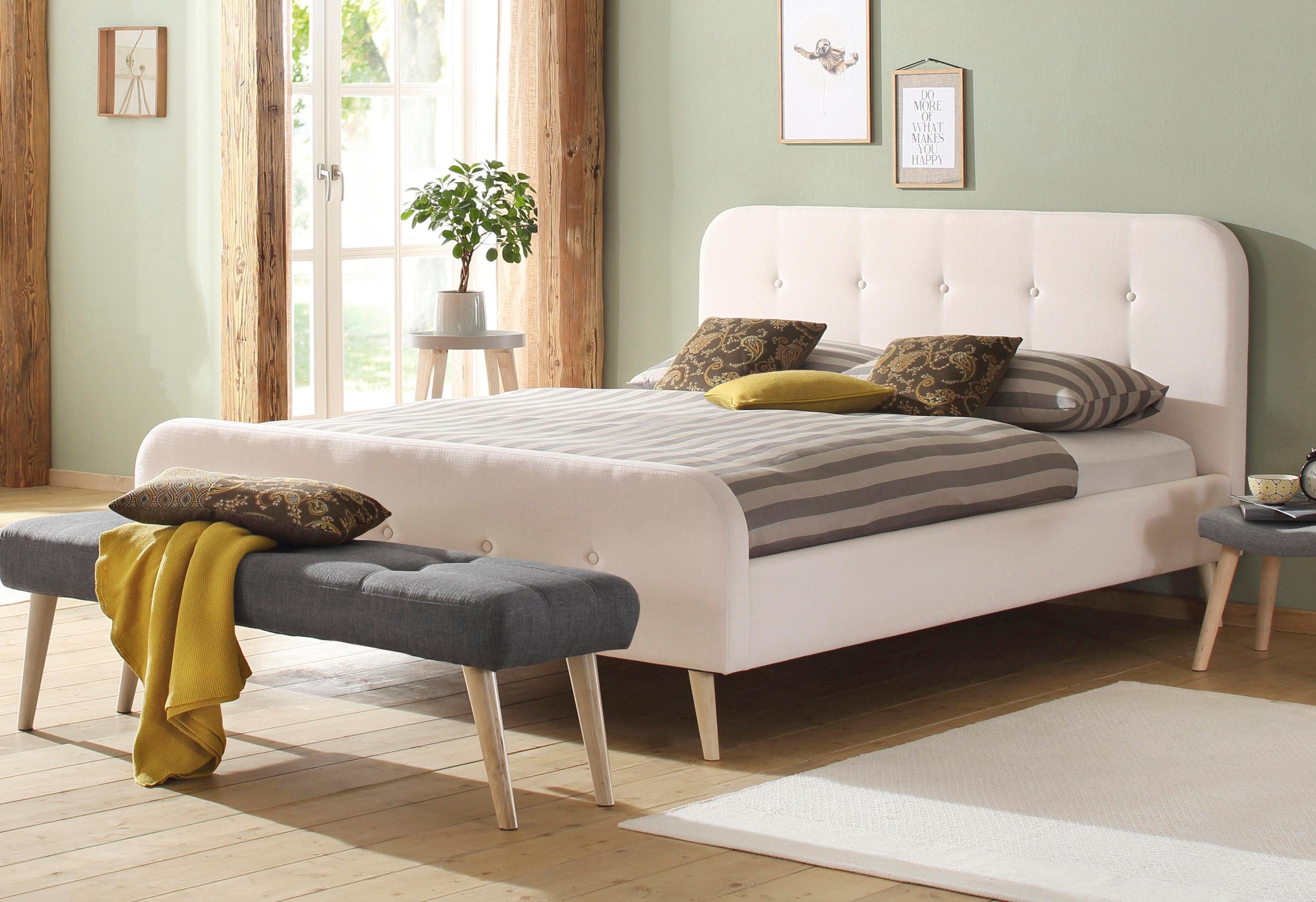 Home affaire Gestoffeerd bed Amrum met luxueuze knopen aan het zacht verdikte hoofd- en voetbord