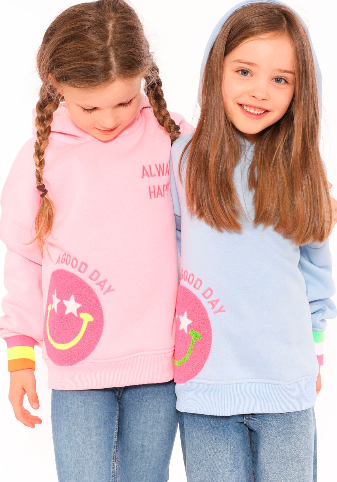 Zwillingsherz Hoodie Always Happy Kids met grote smiley en neonkleurige details