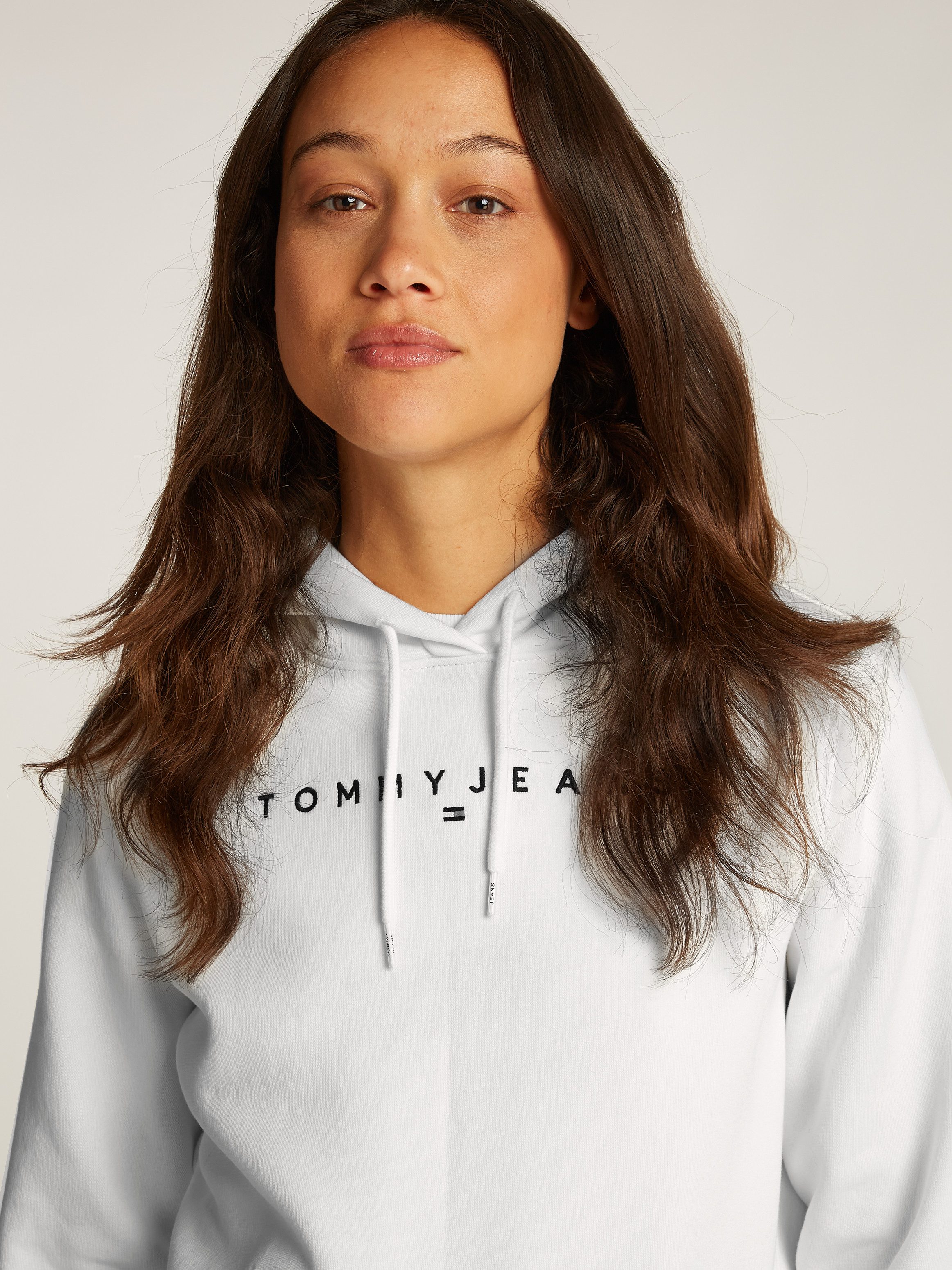 TOMMY JEANS Hoodie TJW REG LINEAR HOODIE met een logo-opschrift