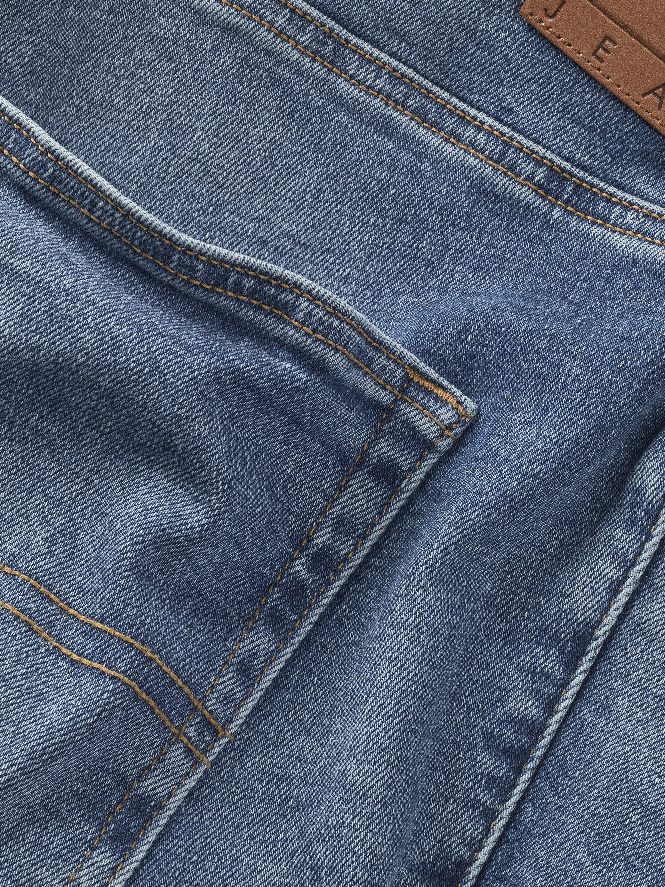 Tommy Jeans Plus Slim fit jeans in grote maten stoned wash look