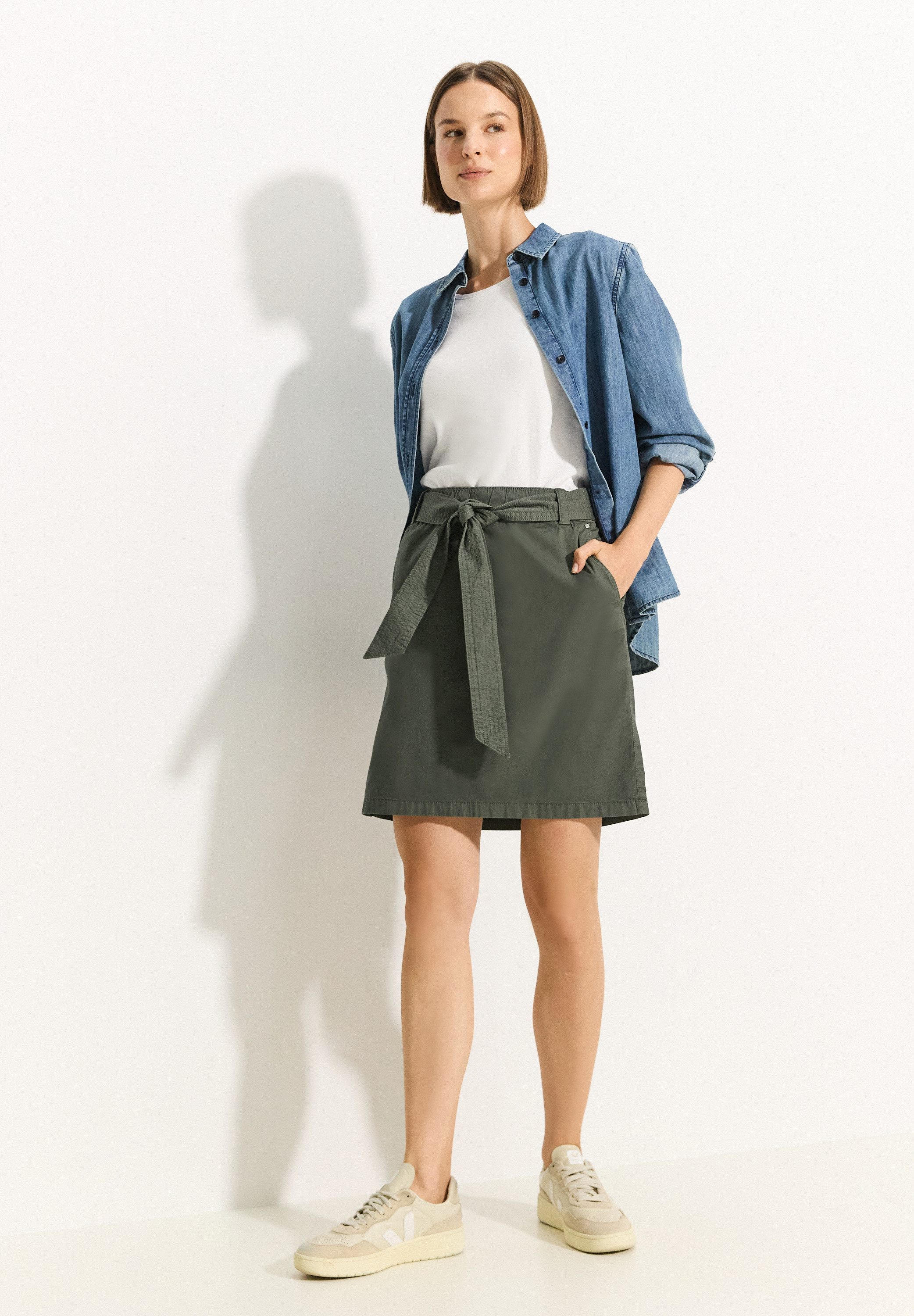 Cecil Midirok met textielen riem