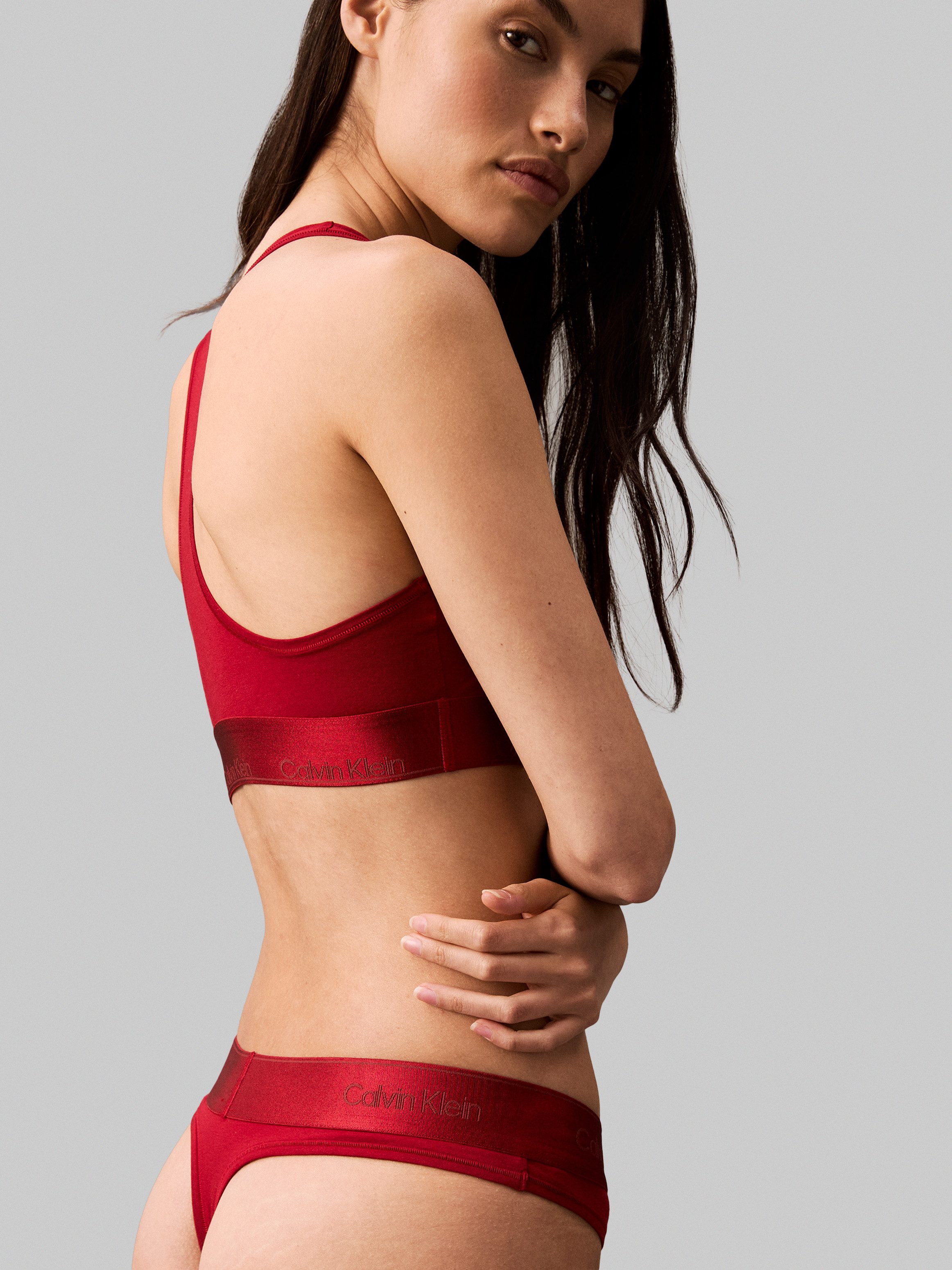 Calvin Klein Stringtanga THONG met glanzende logo-elastische band