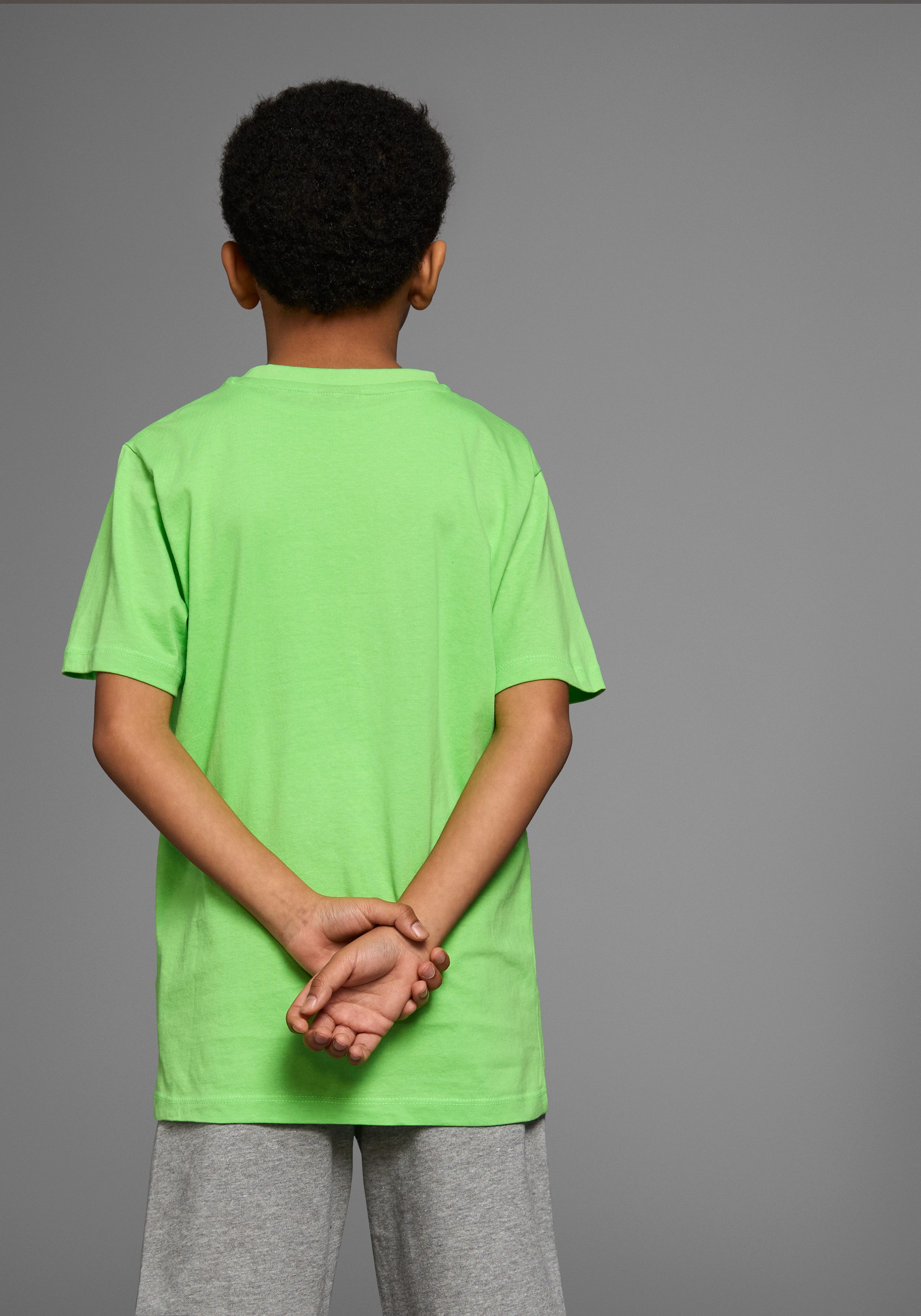 KIDSWORLD T-shirt Met spreuk: WOLLEN IST WIE MACHEN.... Korte mouwen, basic pasvorm, bedrukt, ronde hals