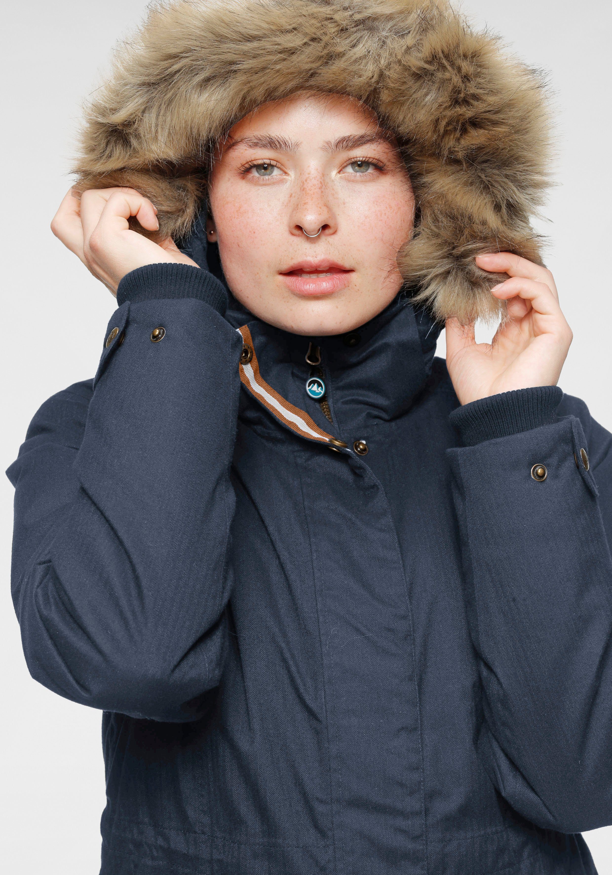 Polarino Functionele parka Ademend, winddicht en waterdicht. Warm gewatteerd.