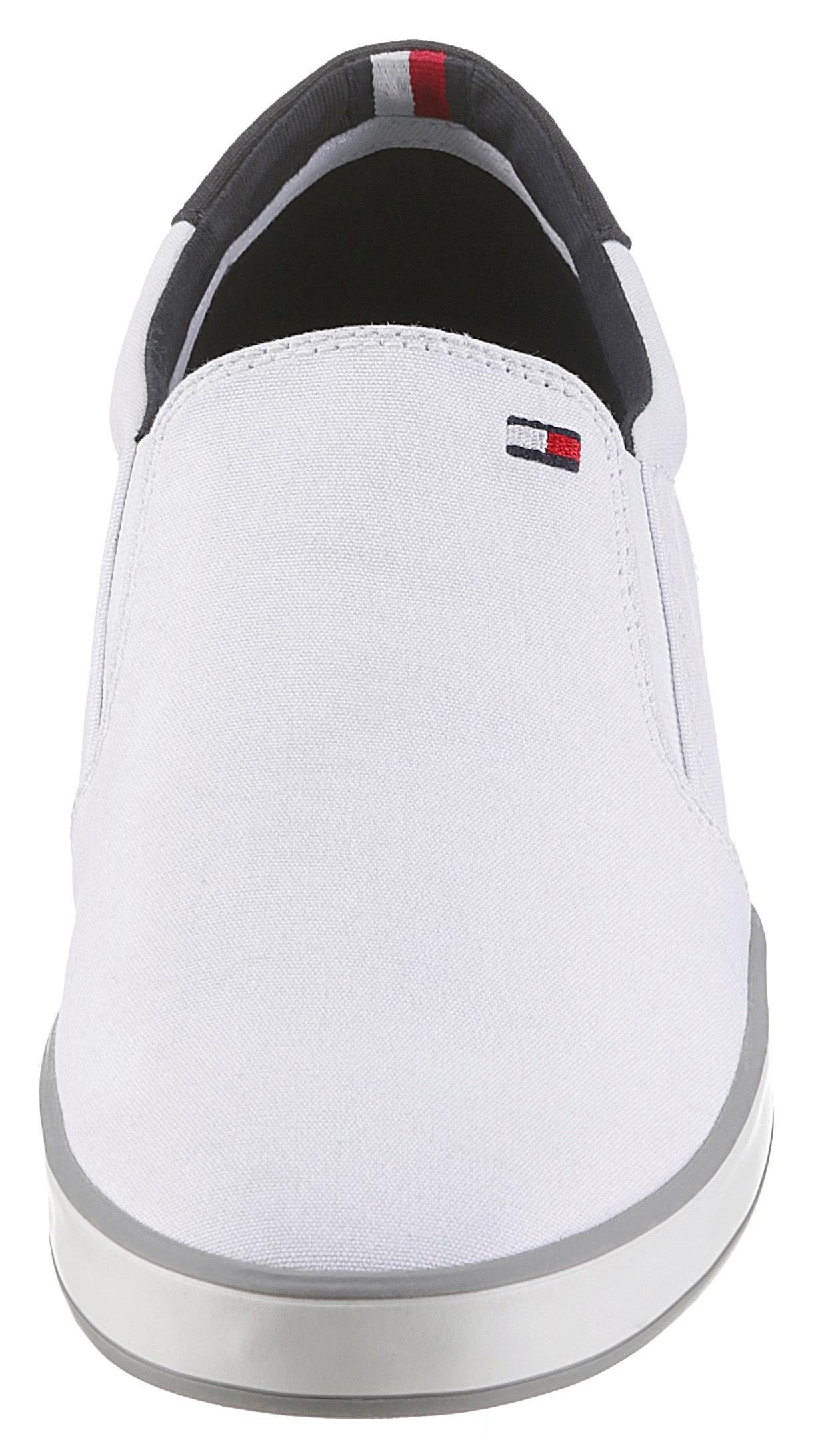 Tommy Hilfiger Slip-on sneakers ICONIC SLIP ON SNEAKER Slipper, vrijetijdsschoen, lage schoen met zij-stretchinzetten