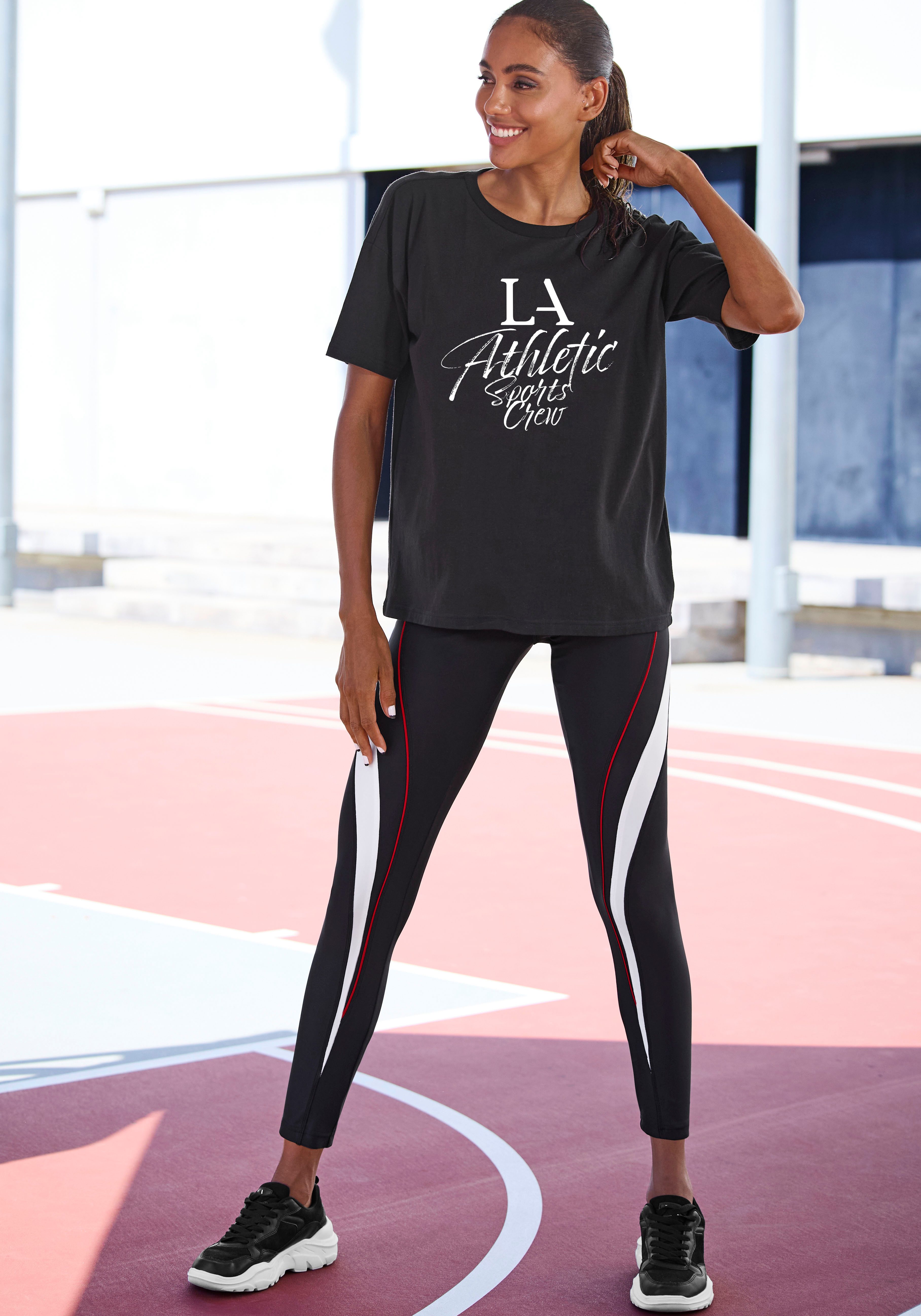 active by Lascana Legging Logo-badge en ritszak op de achterkant