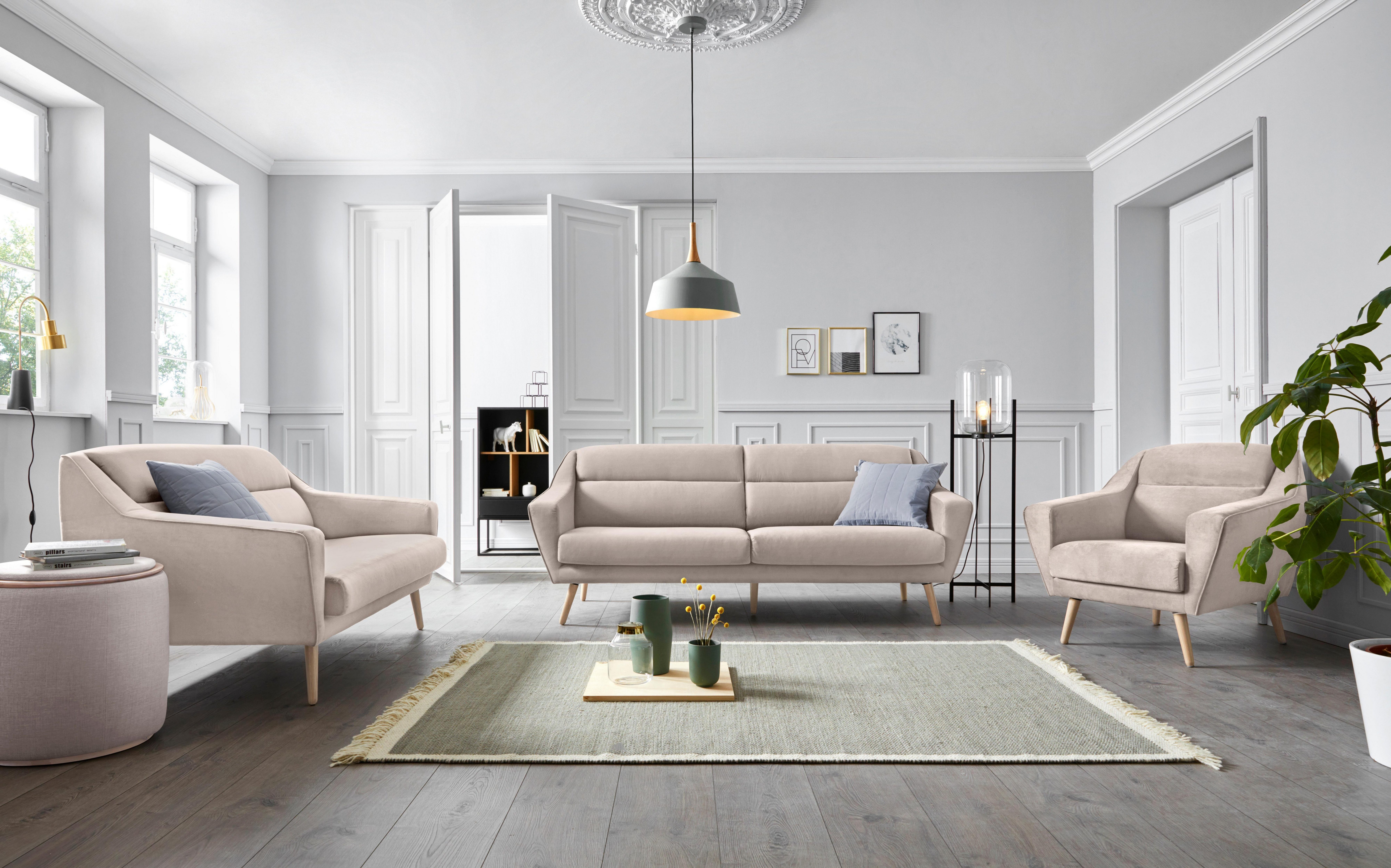 andas Fauteuil Bille met naad in het rugkussen en eikenhouten poten, design by morten georgsen