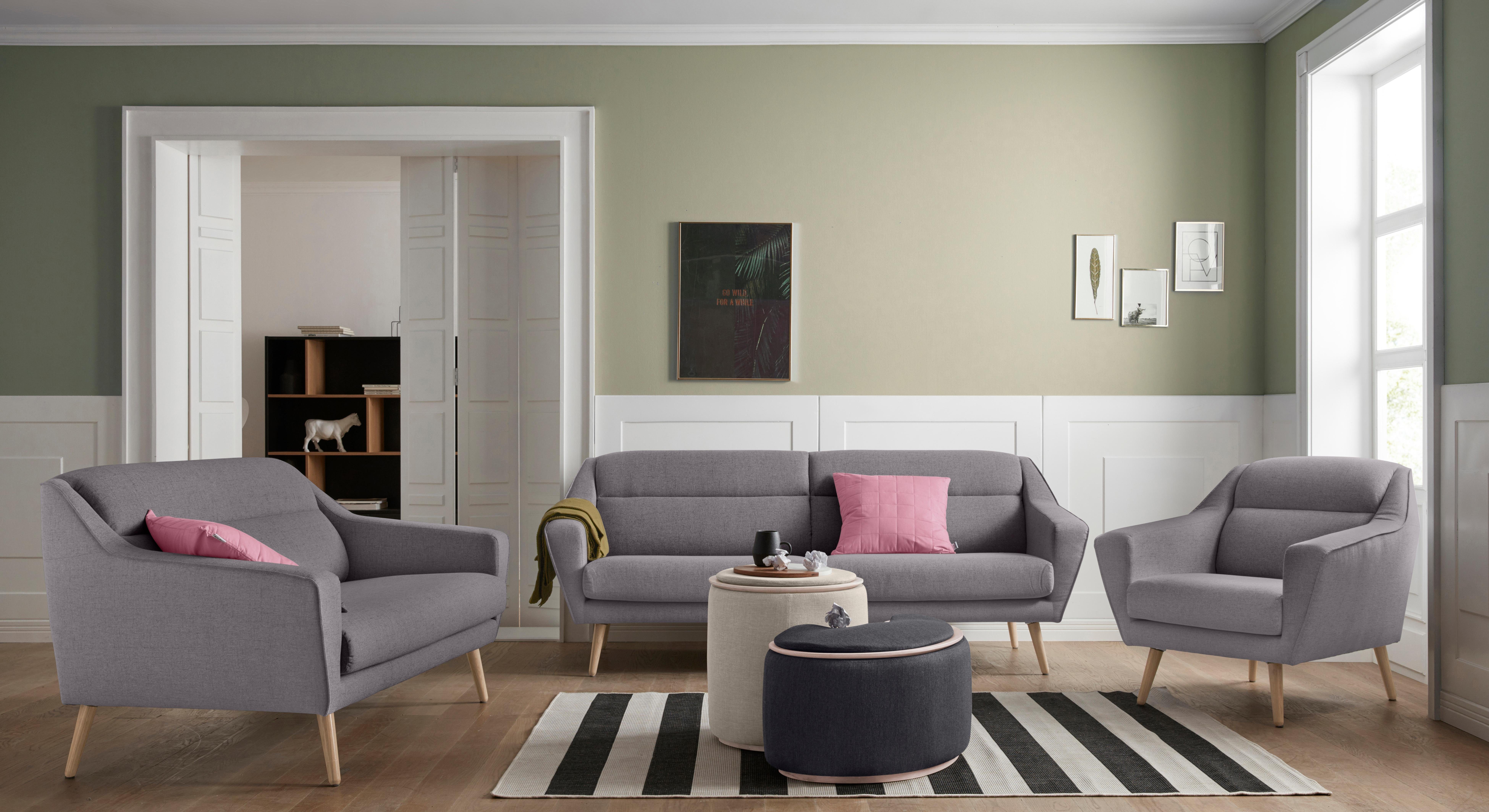 andas Fauteuil Bille met naad in het rugkussen en eikenhouten poten, design by morten georgsen