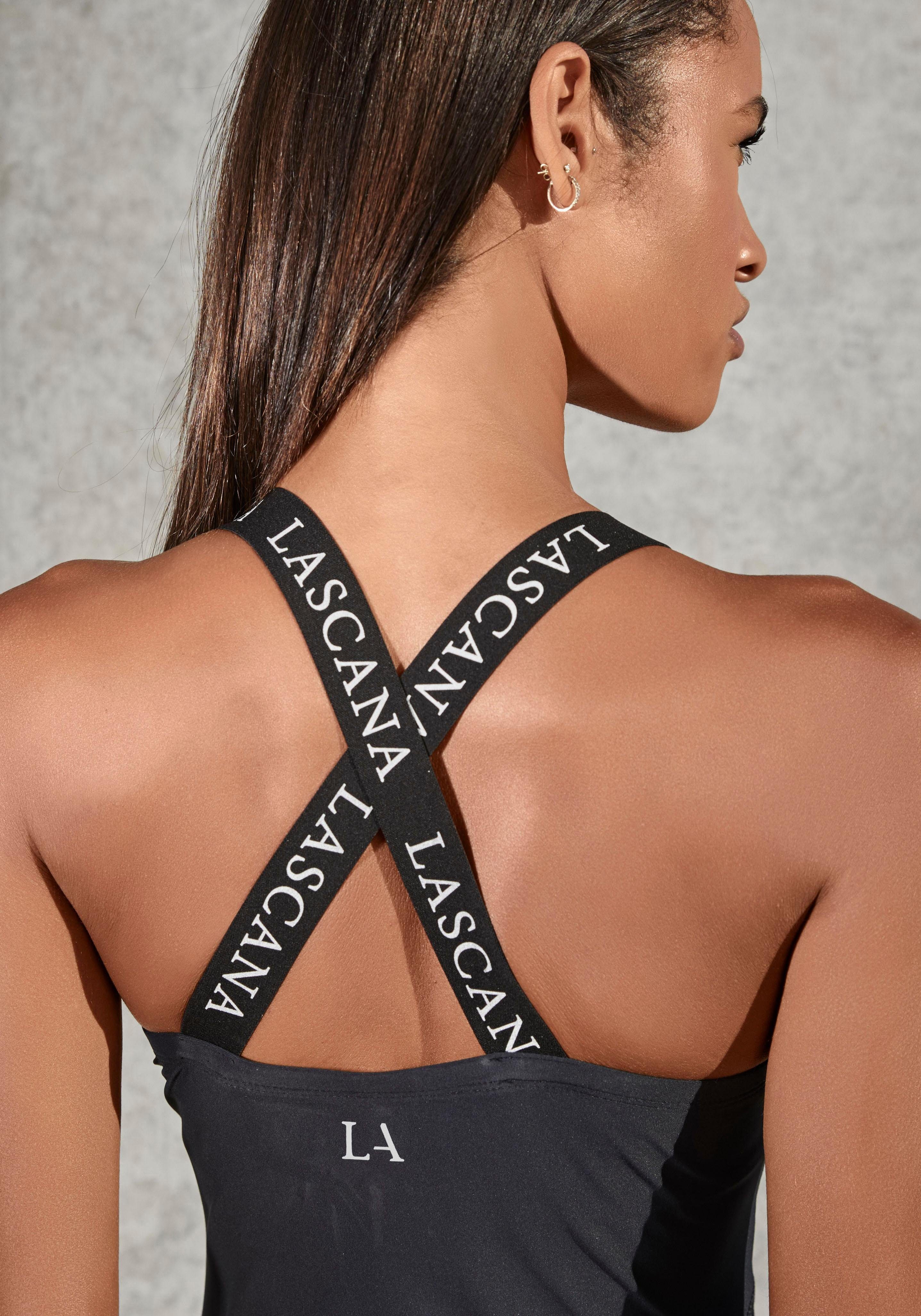 active by Lascana Functioneel shirt met elastische bandjes en mesh