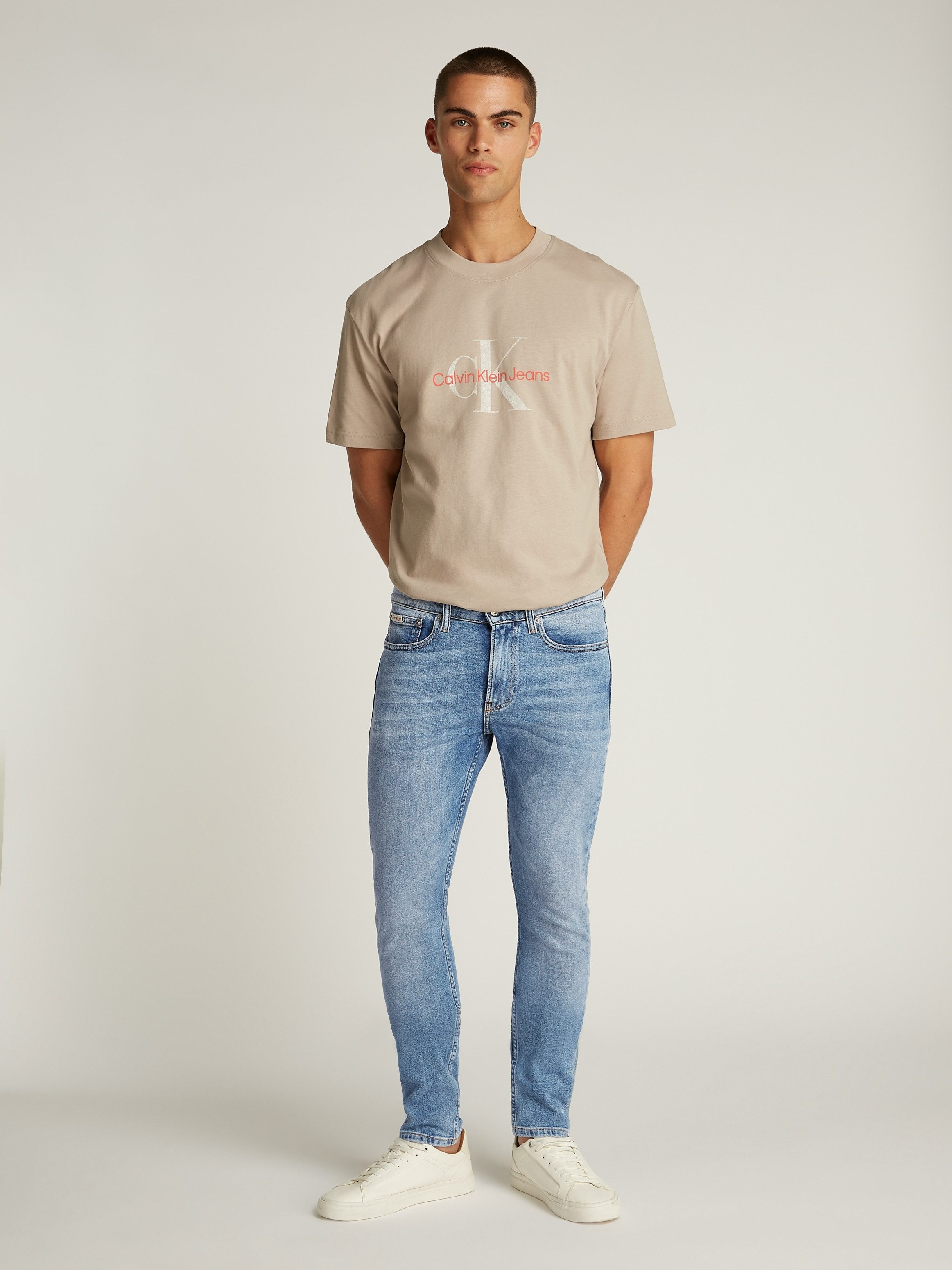 Calvin Klein Slim fit jeans SLIM TAPER Muntzakje, logo borduursel