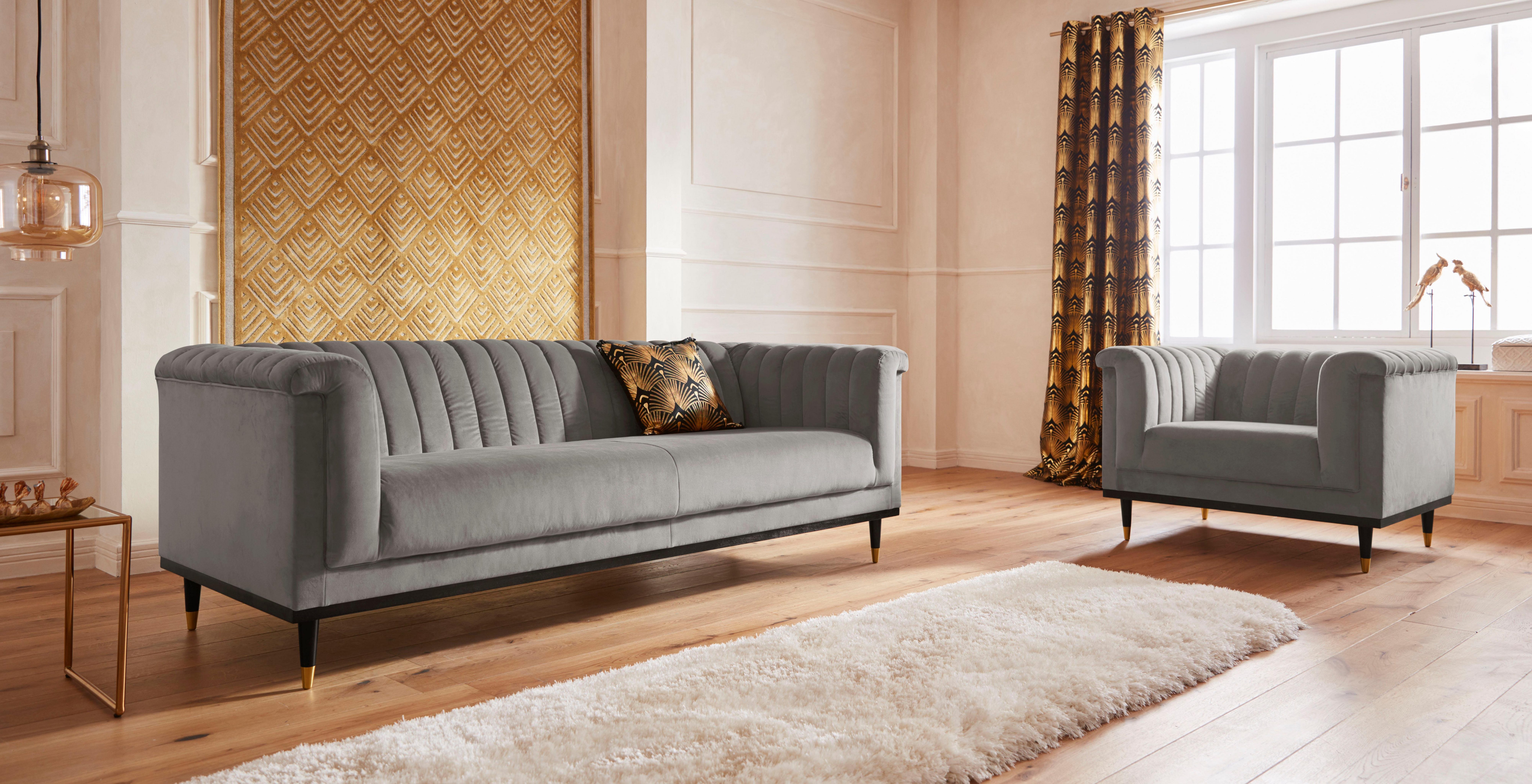 Guido Maria Kretschmer Home&Living Fauteuil Chamby met houten rand onder en stiksels bij de leuning