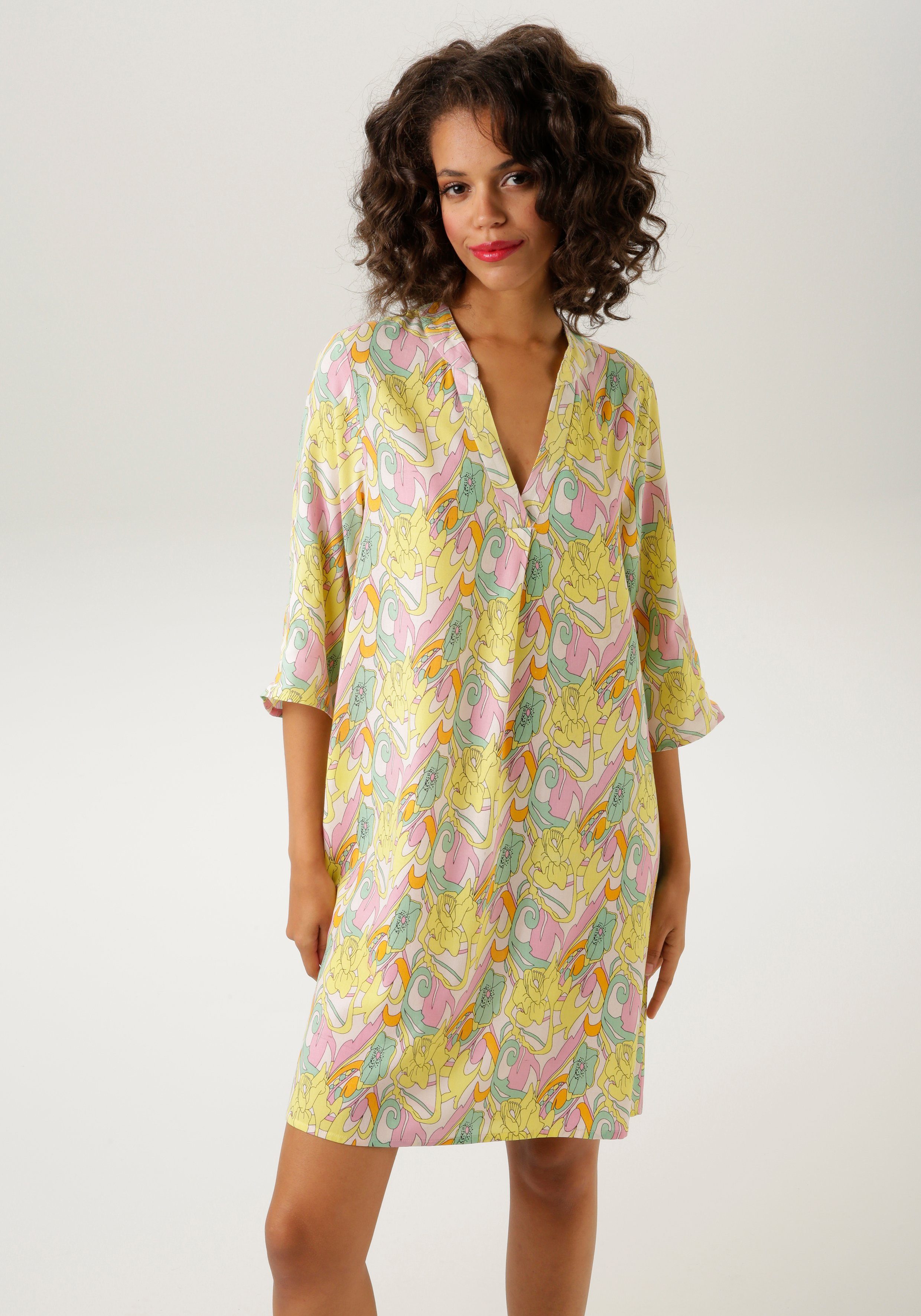 Aniston CASUAL Zomerjurk met pastelgekleurde grafische bloemenprint