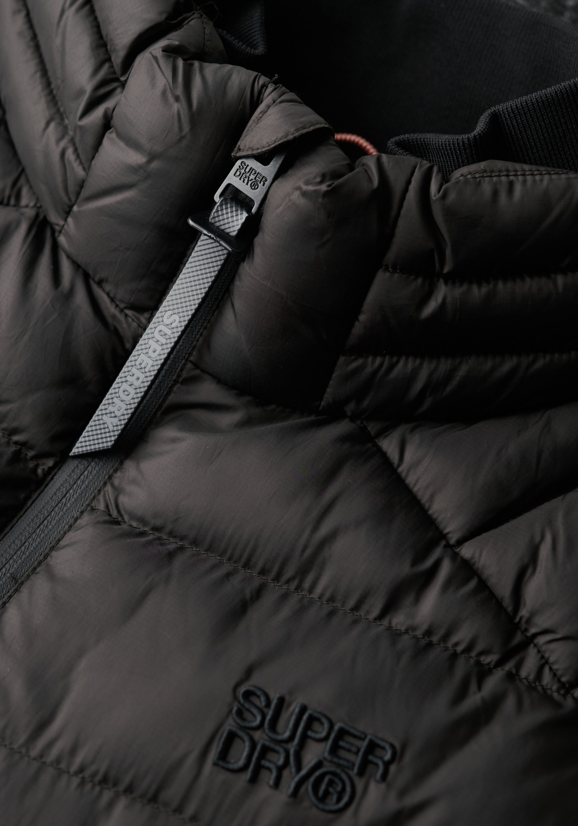 Superdry Gewatteerde jas STORM KNIT HYBRID PADDED JKT