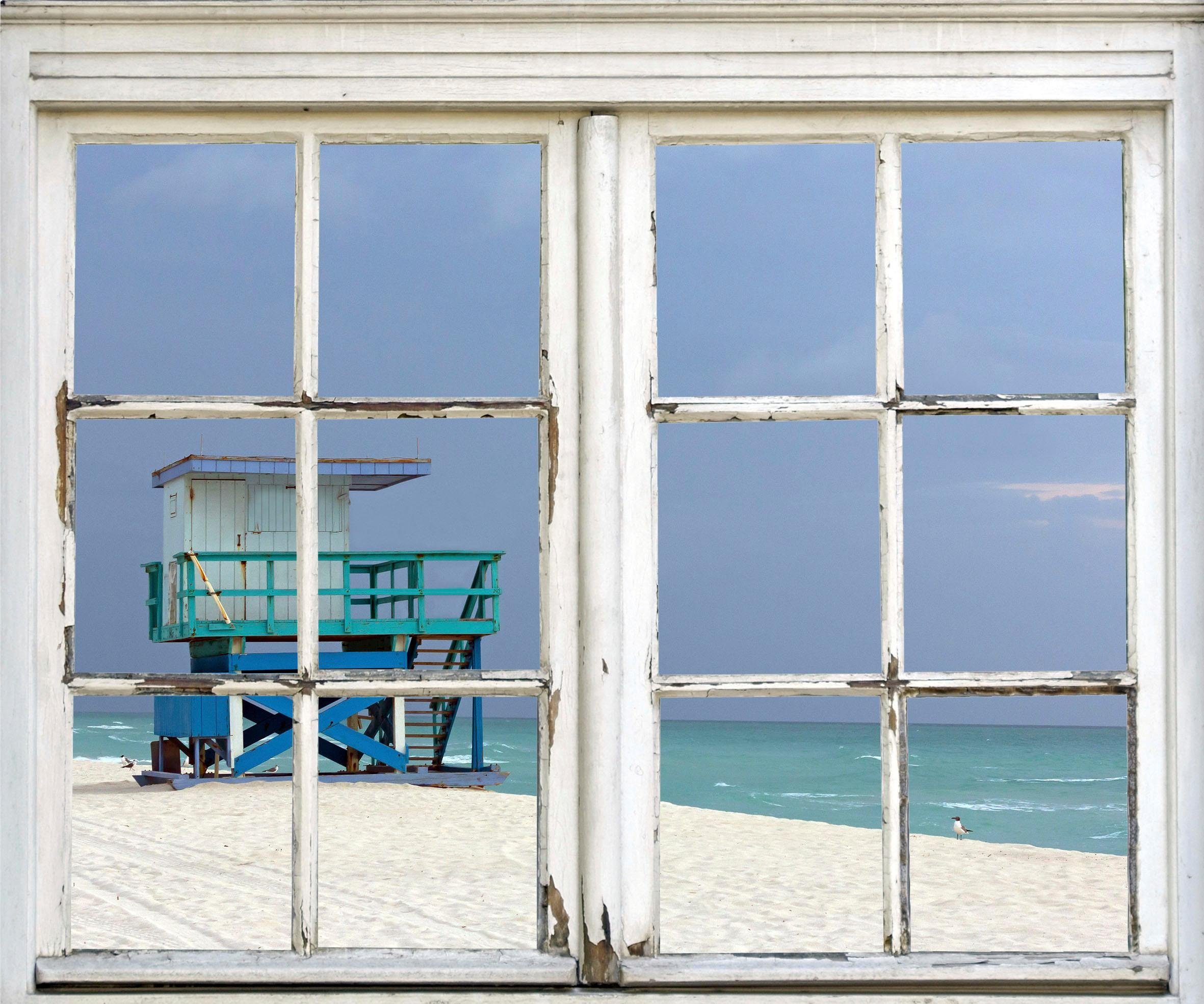 queence Wandfolie Hut aan het strand