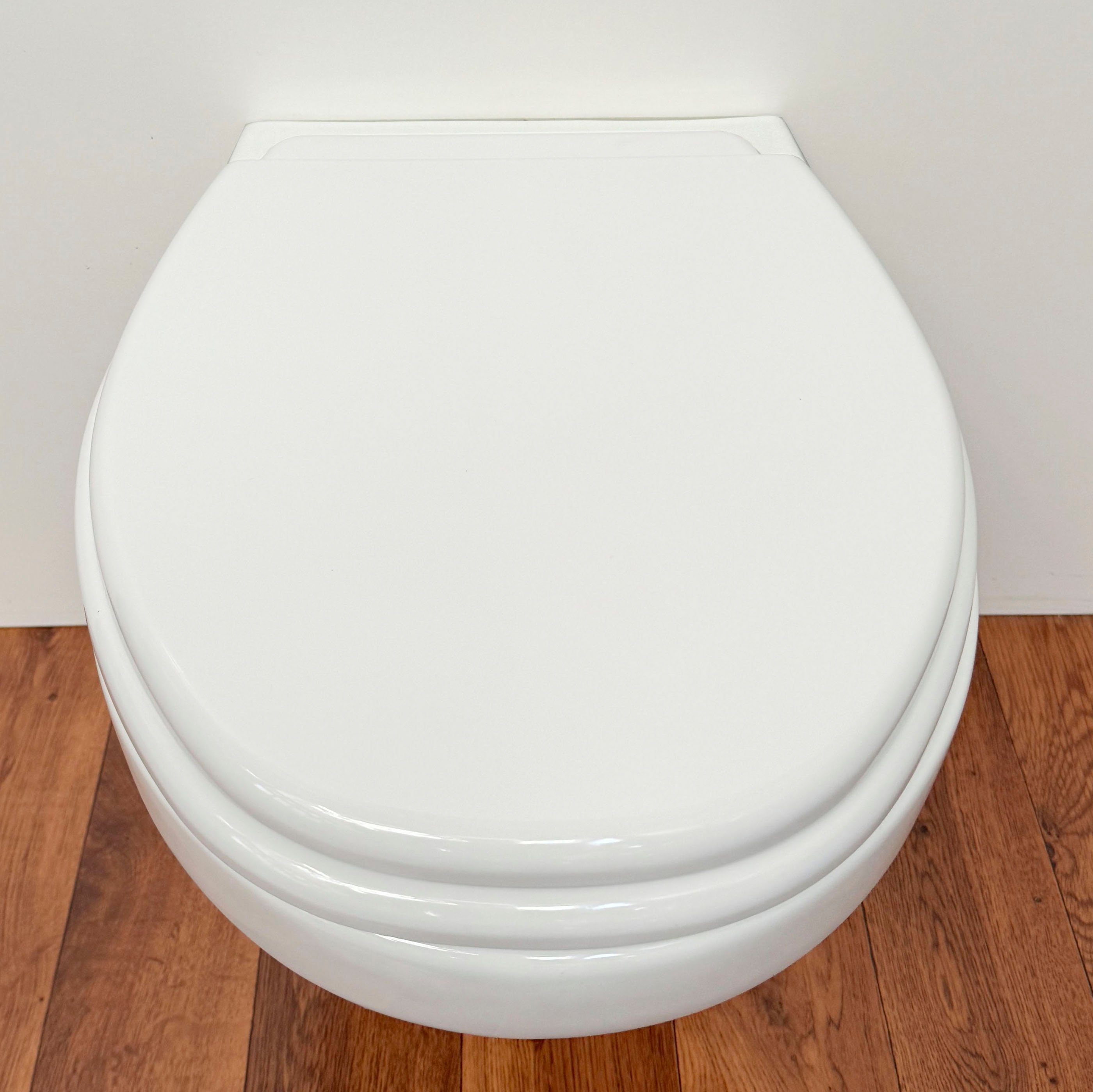ADOB Toiletzitting Milano met rugpaneel als probleemoplosser