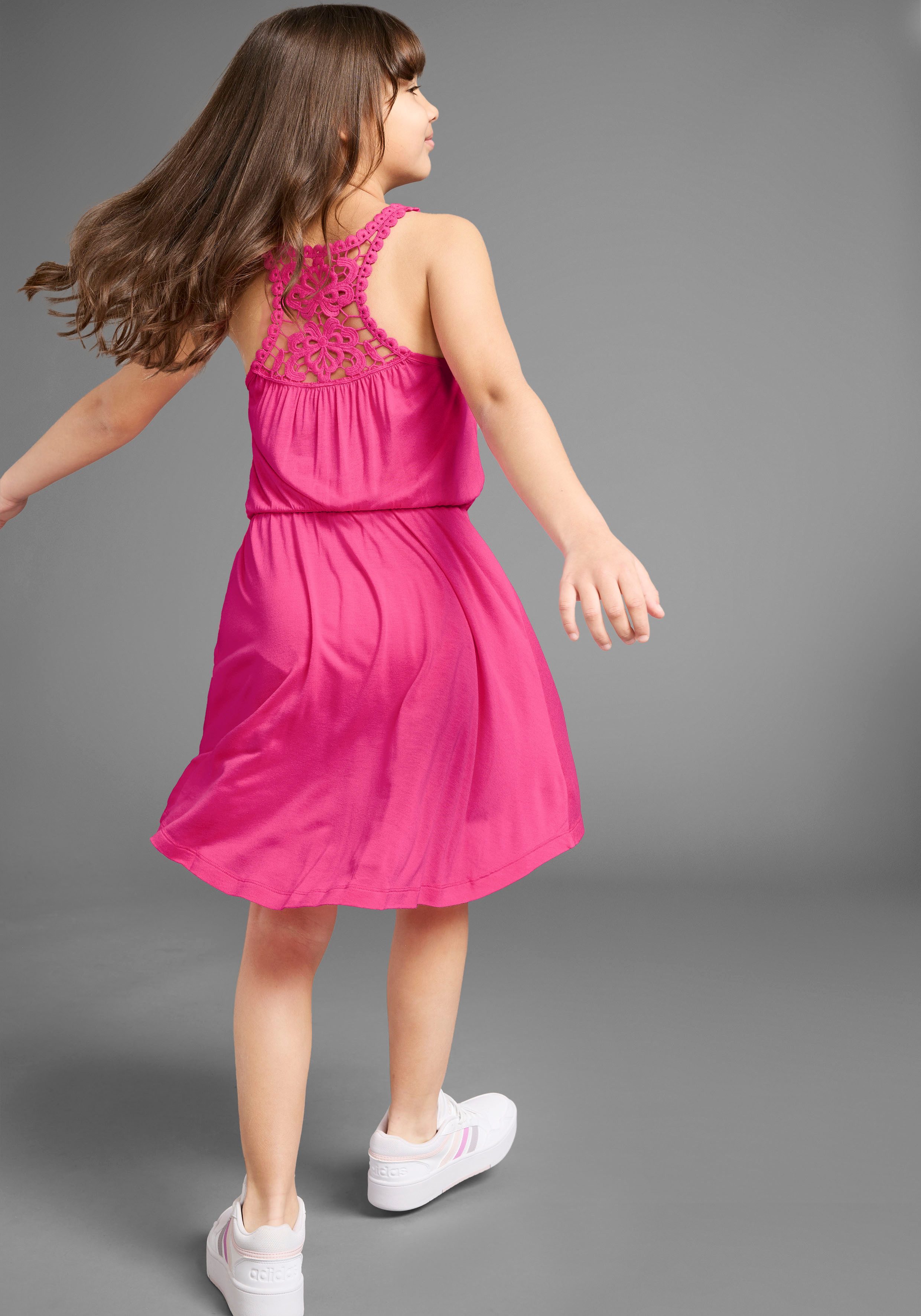 KIDSWORLD Jerseyjurk Met verfijnde kant op de rug